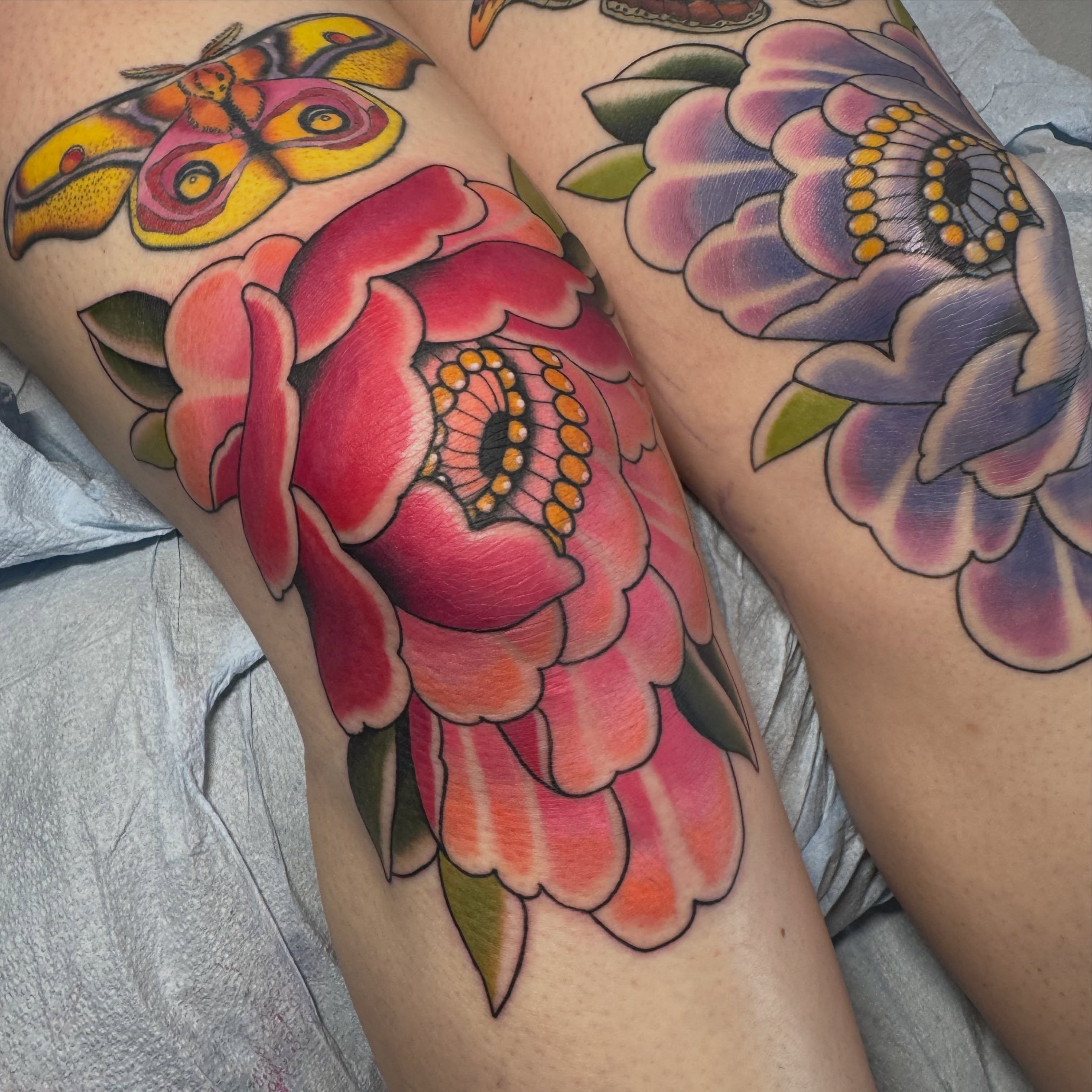 Peony American traditional tattoo on the thigh by Kaley, Des Moines, Iowa