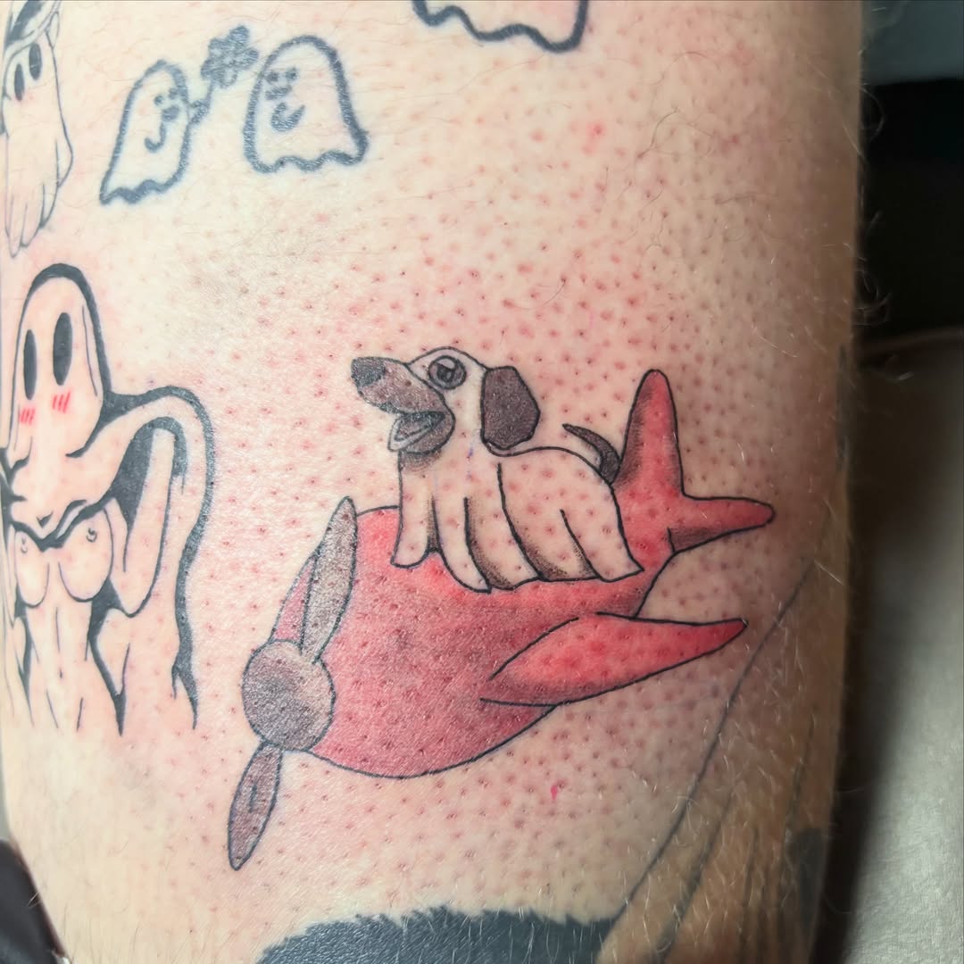 Dog and airplane American traditional tattoo on the forearm by ✨Tattoos By Martina ✨
