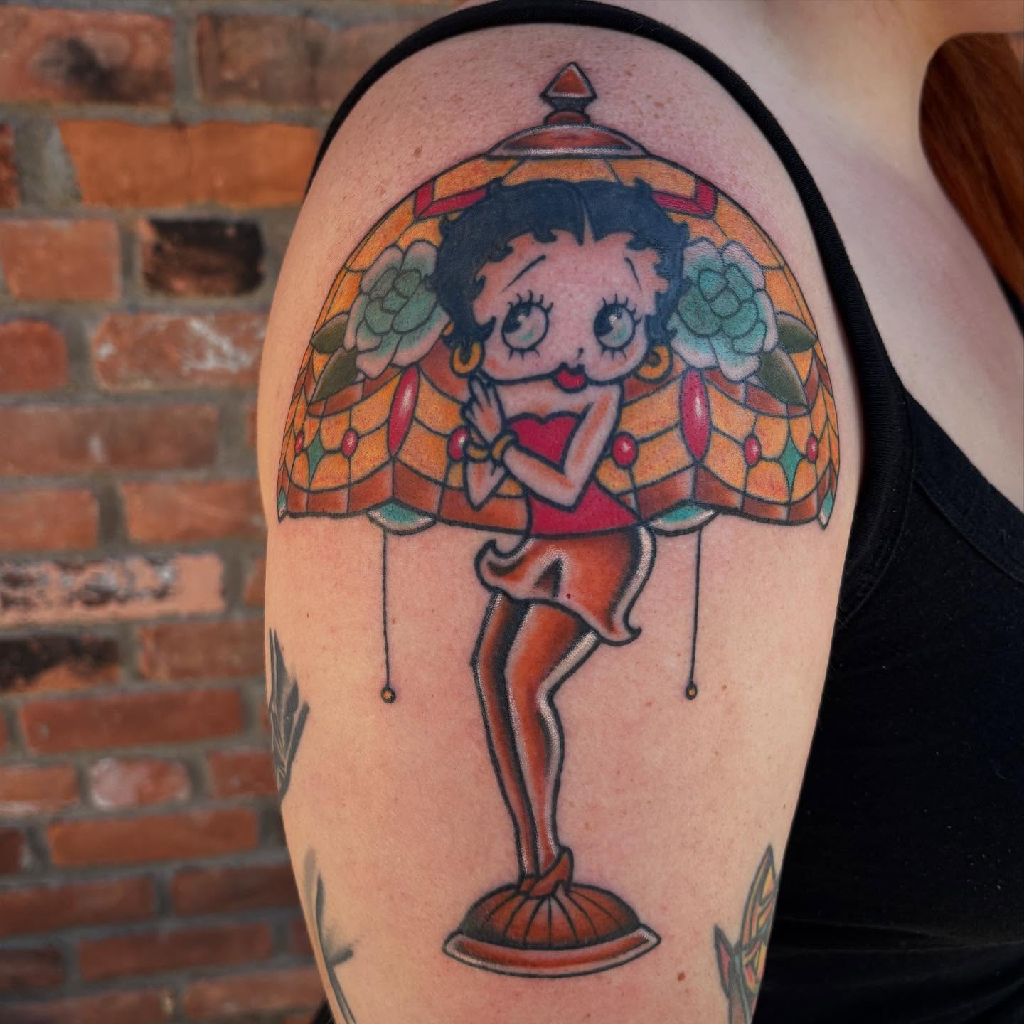 Betty Boop American traditional tattoo on the shoulder by Brandi ⛓, Detroit, Michigan