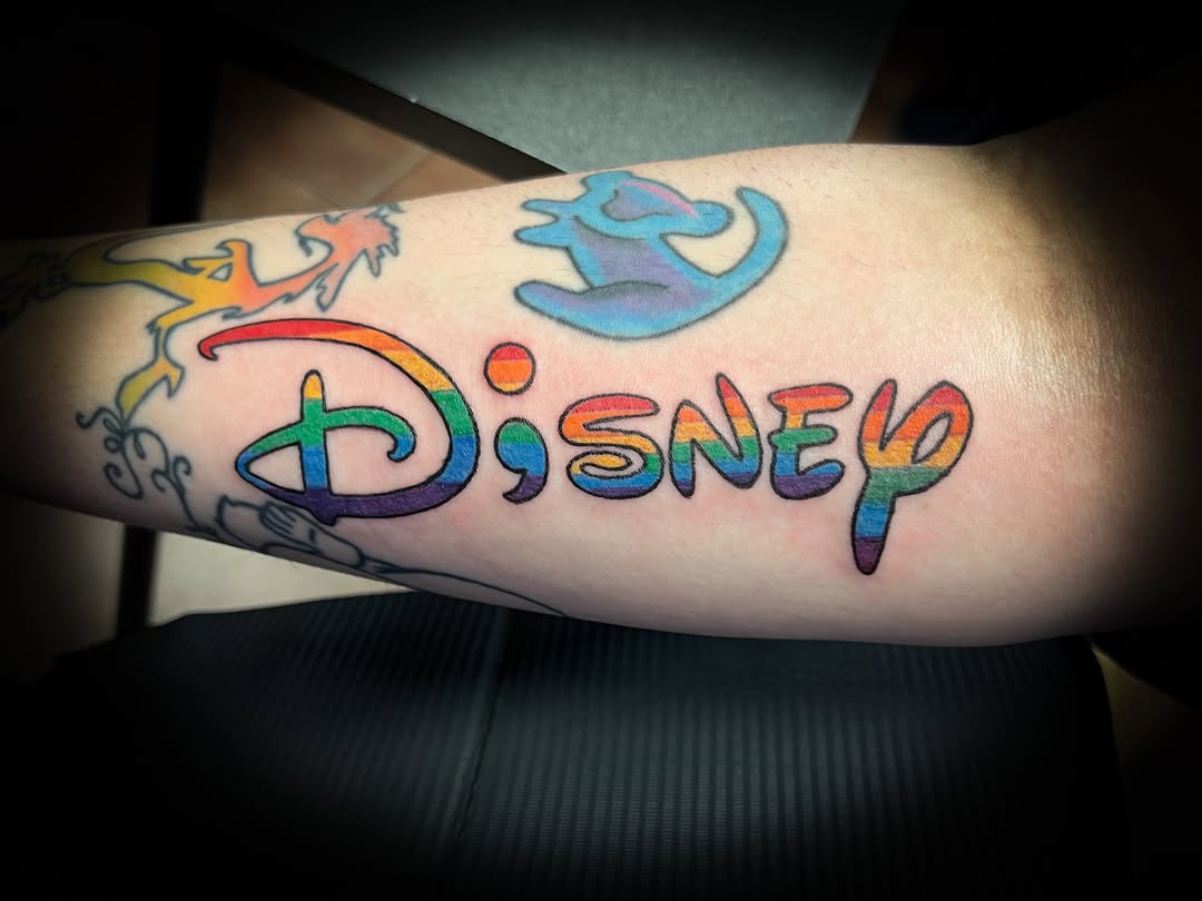 Disney logo lettering script tattoo on the forearm by Melissa Peña NYC