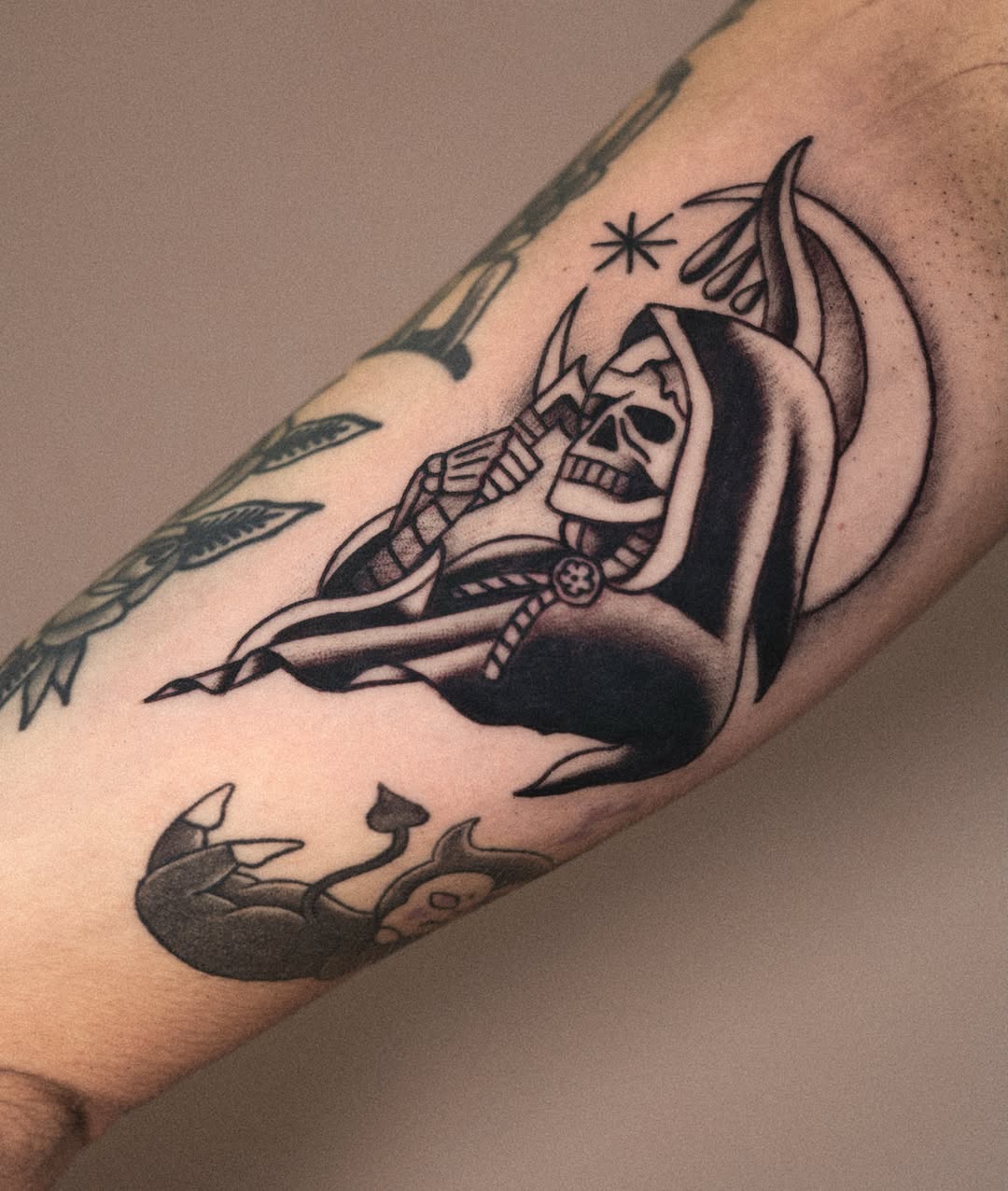 Reaper American traditional tattoo on the forearm by Dylan Mott