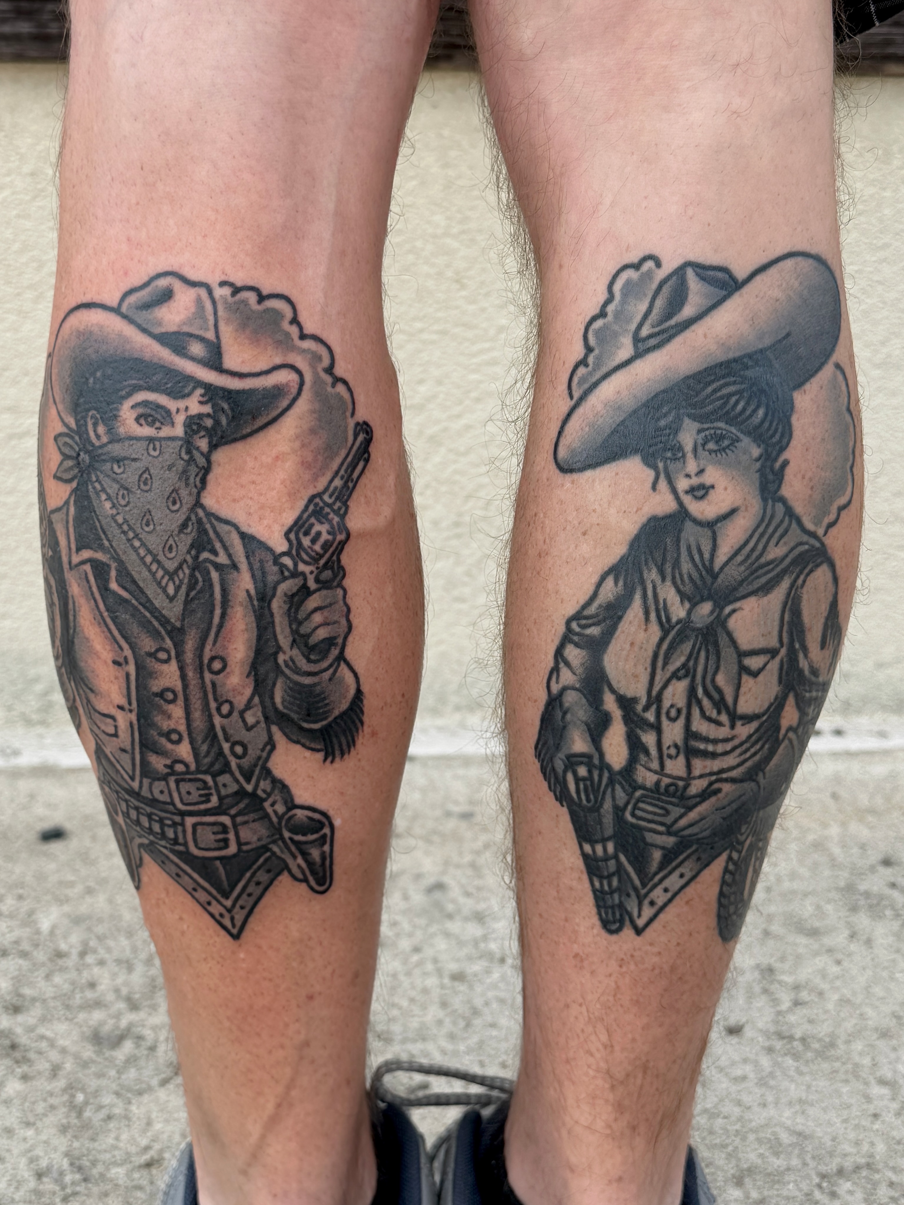 Cowboy and cowgirl American traditional tattoo on the calf by Patrick Miller, Huber Heights, Ohio