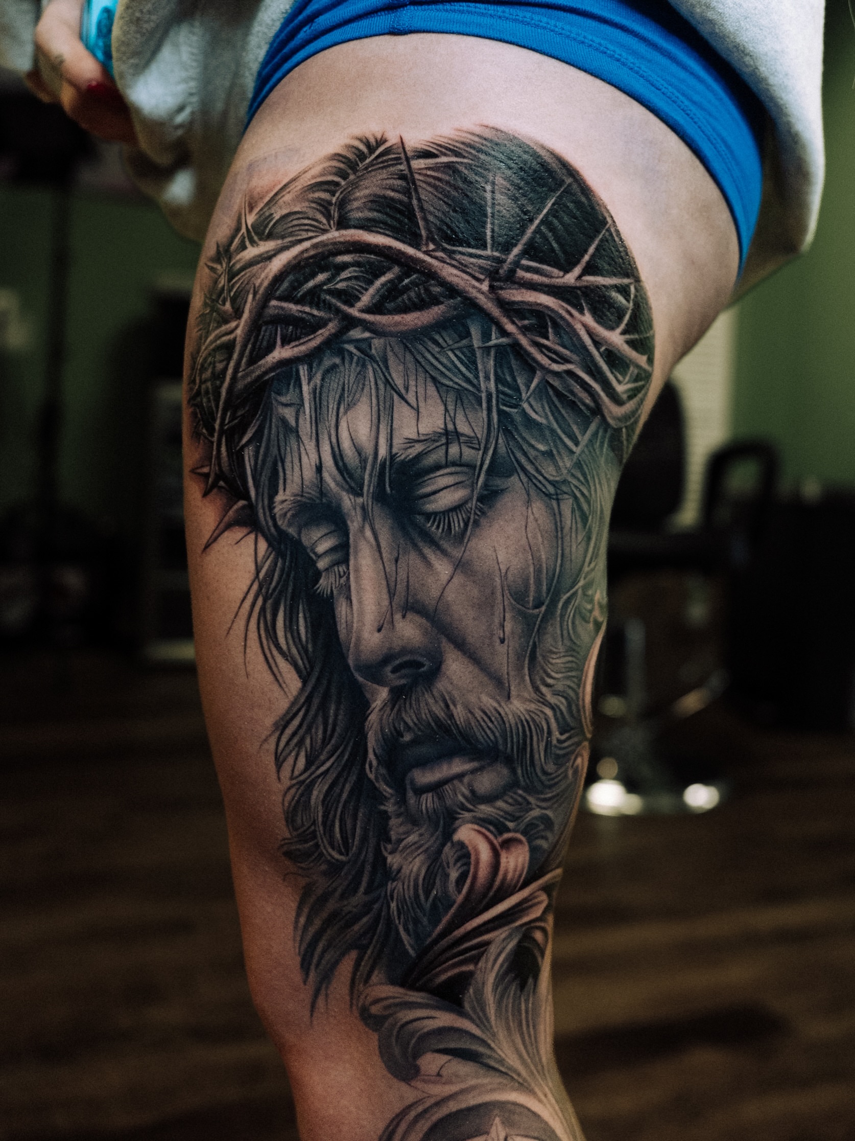 Jesus Christ realism tattoo on the thigh by Ray Paponetti - Tattoo Artist Delray Beach