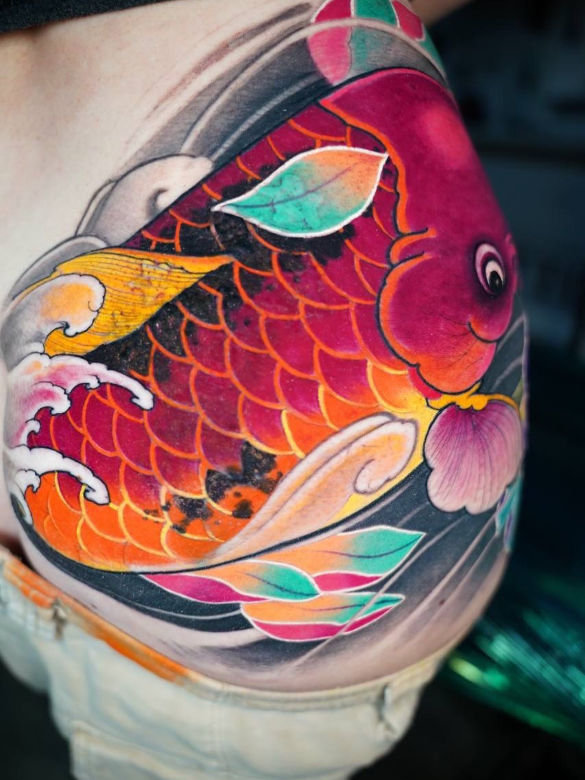 Koi fish japanese irezumi tattoo on the thigh by Grego Hernandez, Miami, Florida
