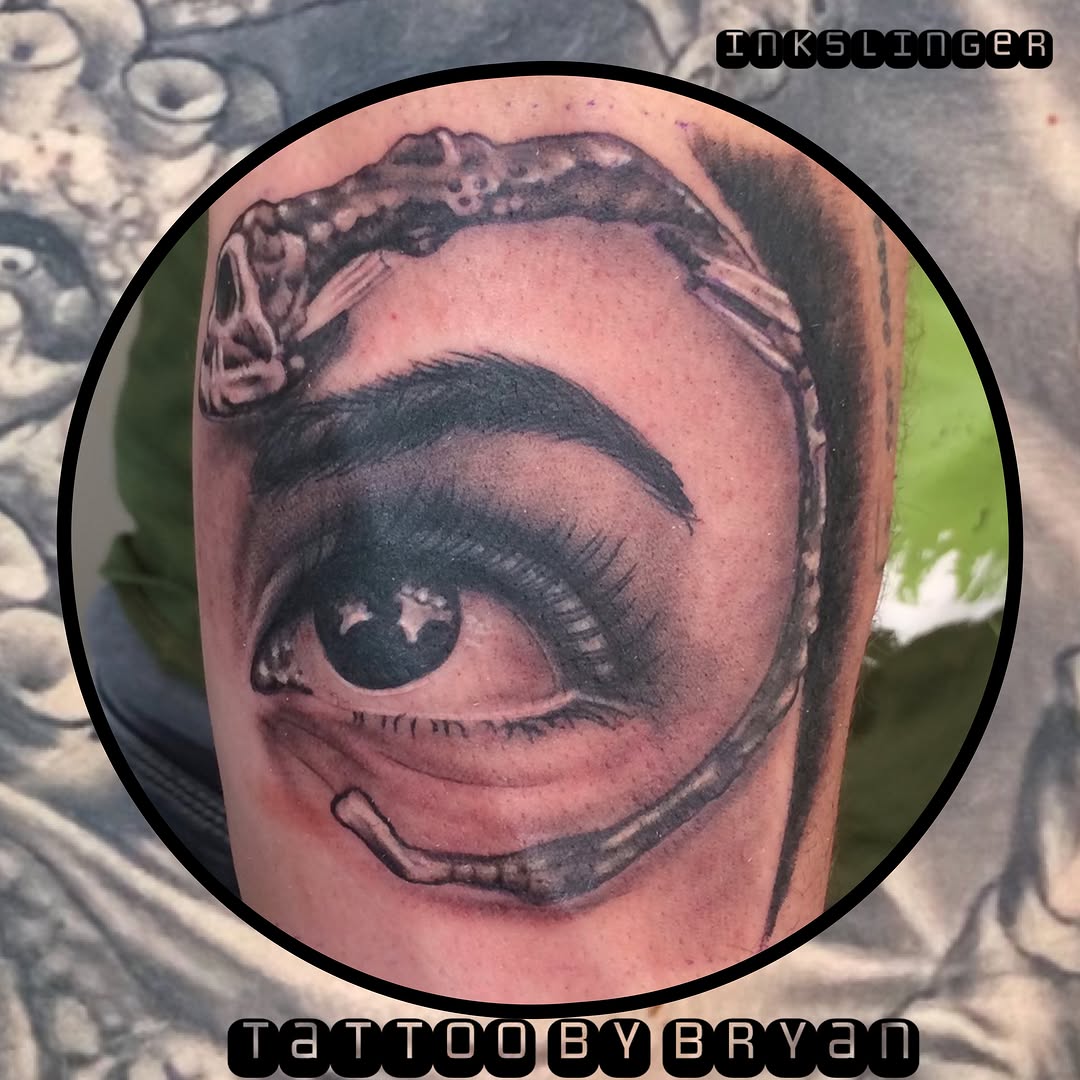 Eye realism tattoo on the forearm by Bryan Hunt