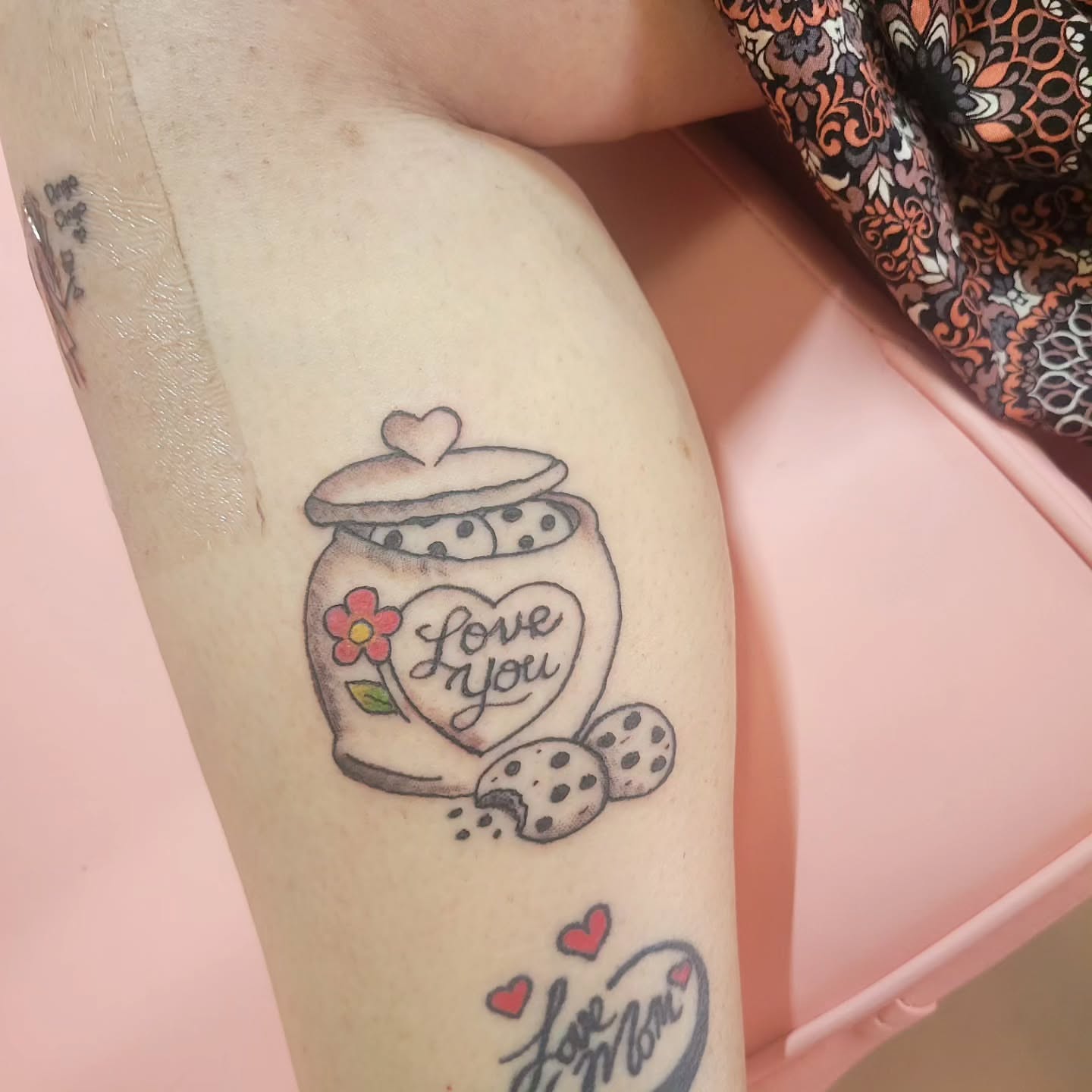 Cookie jar dotwork tattoo on the thigh by Peach & Poke, Lethbridge, Alberta