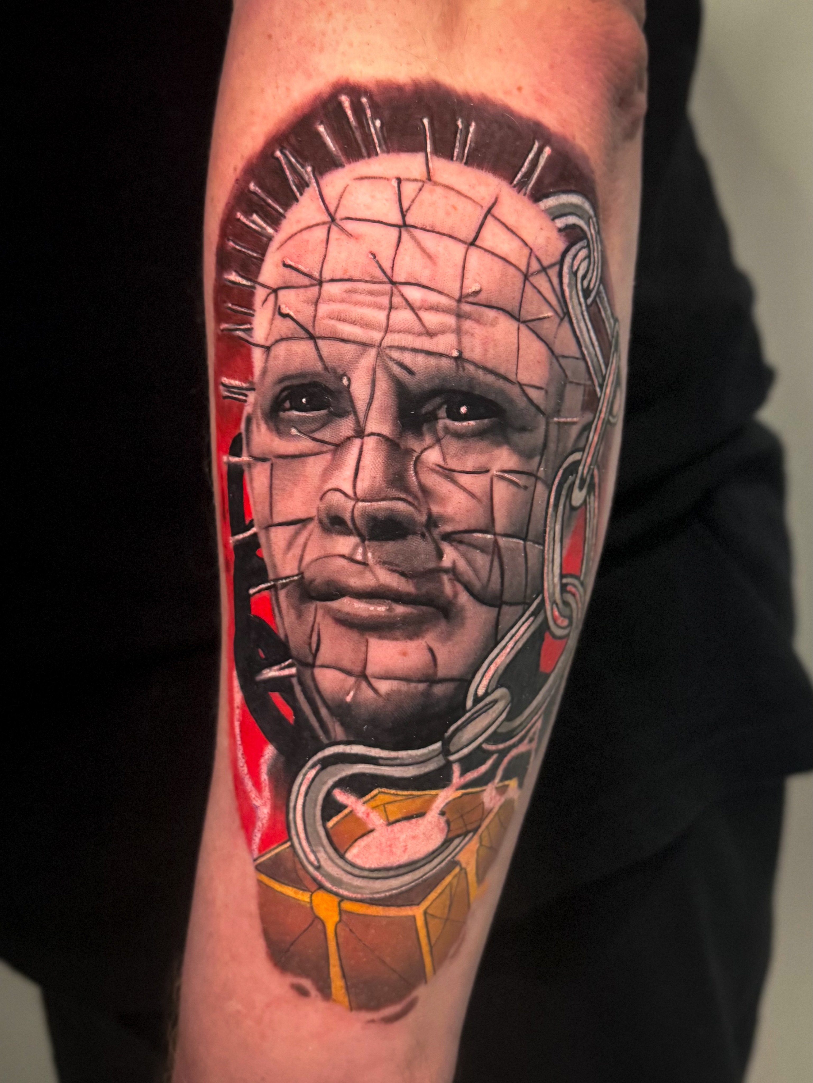 Pinhead realism tattoo on the forearm by Sam Babcock