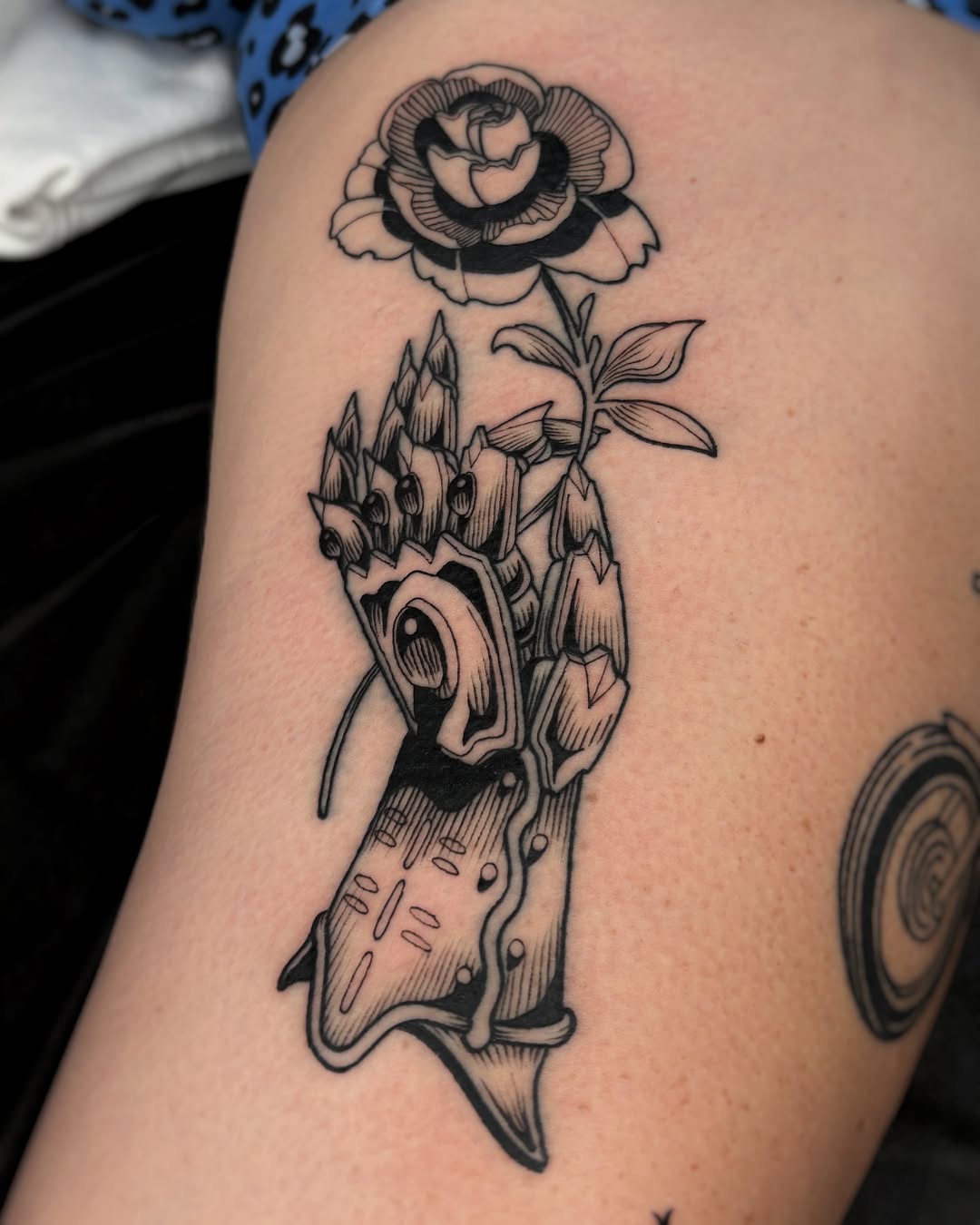 Rose and crown black and grey tattoo on the thigh by Kuya, Berkeley, California