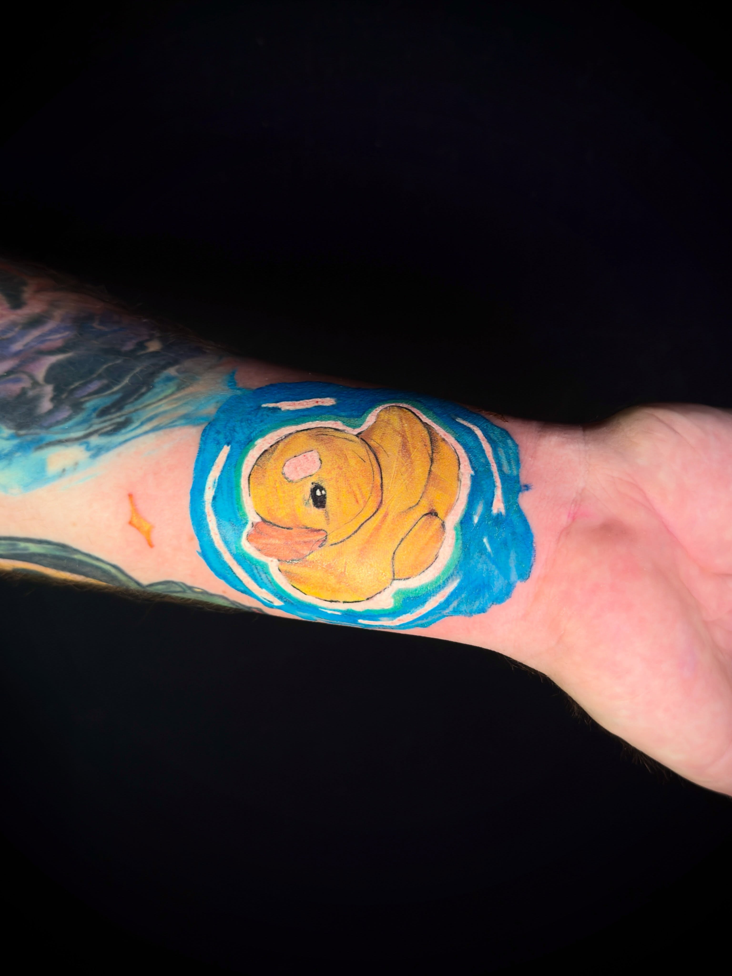 Clownfish new school tattoo on the forearm by Jorell Elie