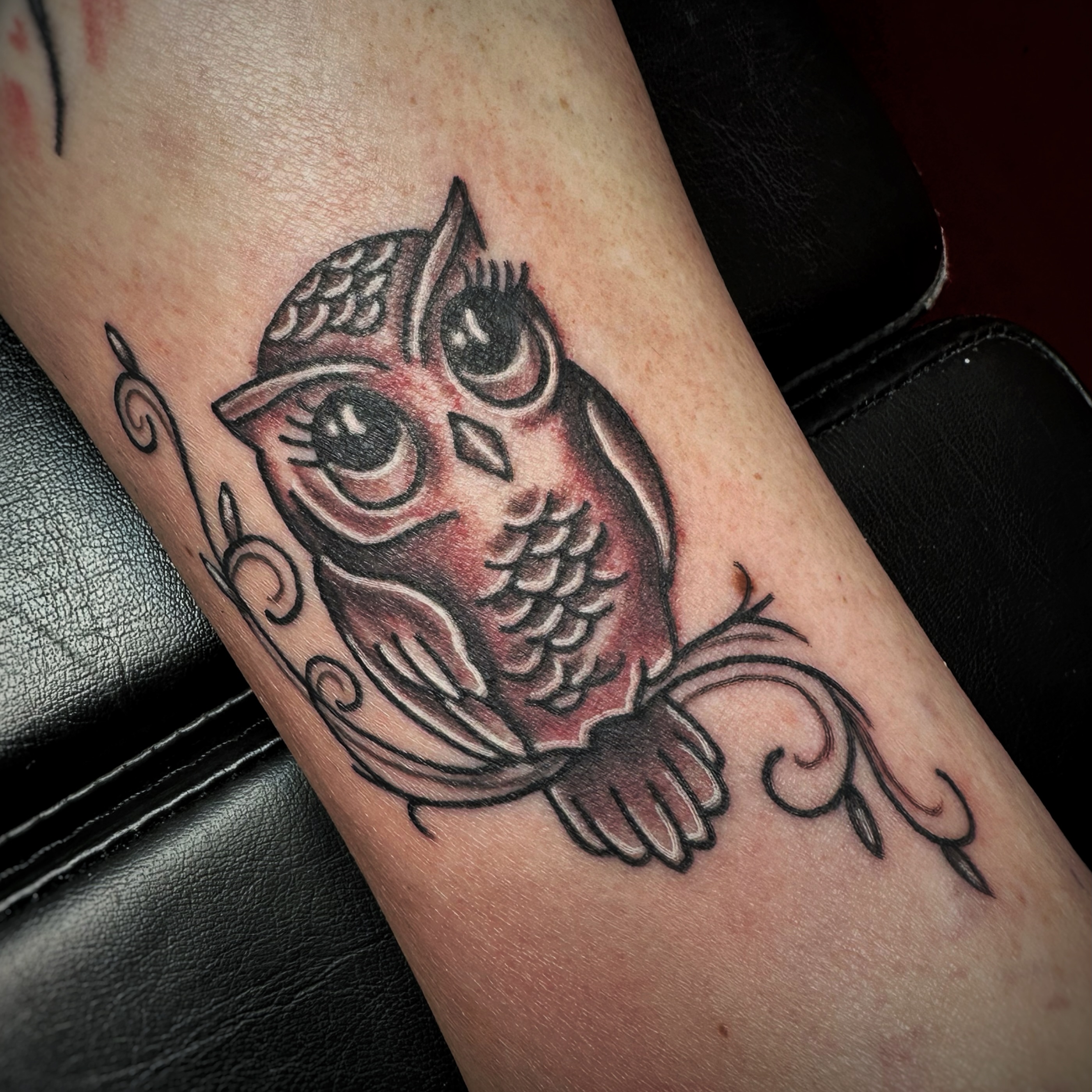 Owl American traditional tattoo on the forearm by Anthony Guido
