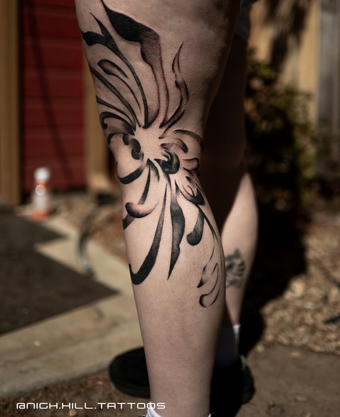 Floral design tribal tattoo on the calf by Boise Tattoo Artist