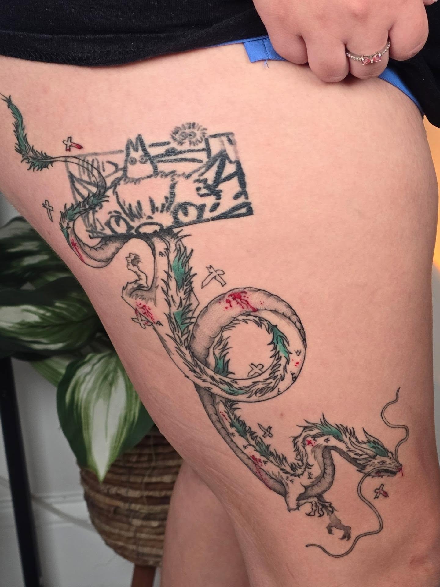 Dragon American traditional tattoo on the thigh by Scribbles (Teala René), Charlotte, North Carolina