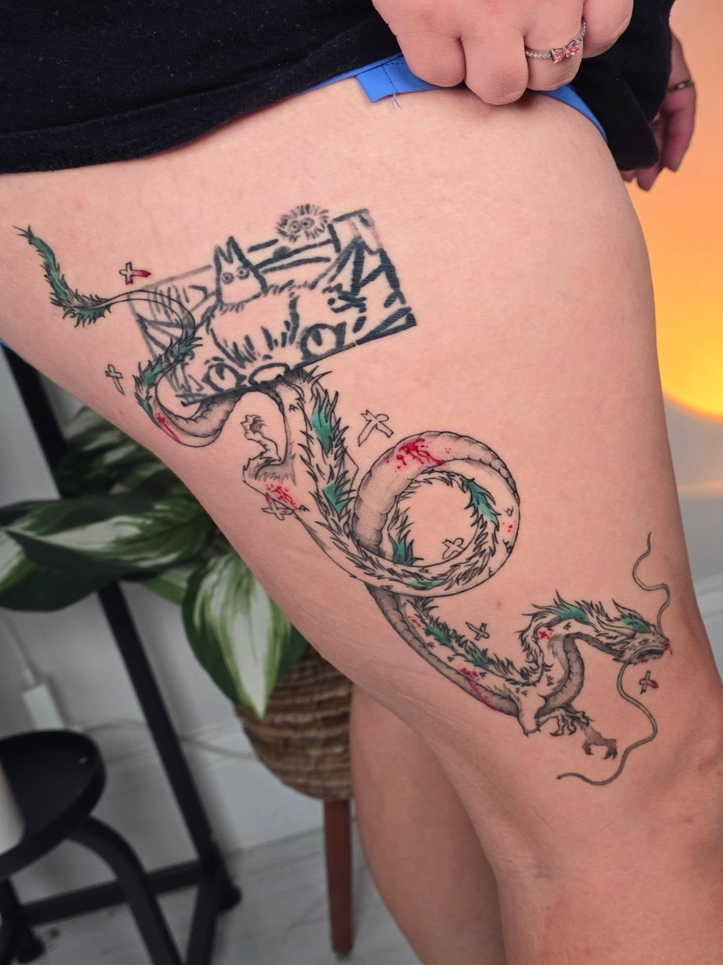 Dragon American traditional tattoo on the thigh by Scribbles (Teala René), Charlotte, North Carolina