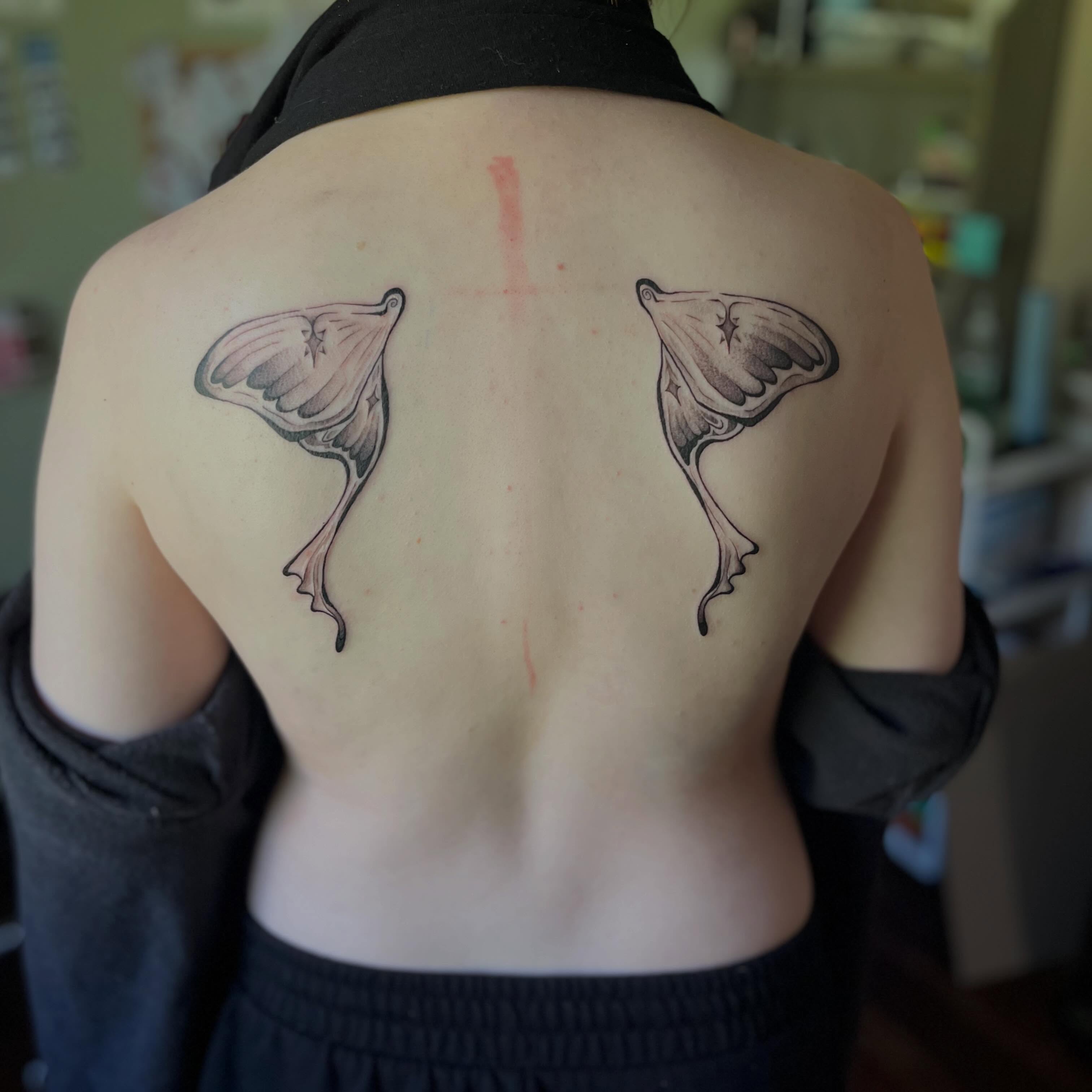 Winged fairy dotwork tattoo on the back by Jazzy