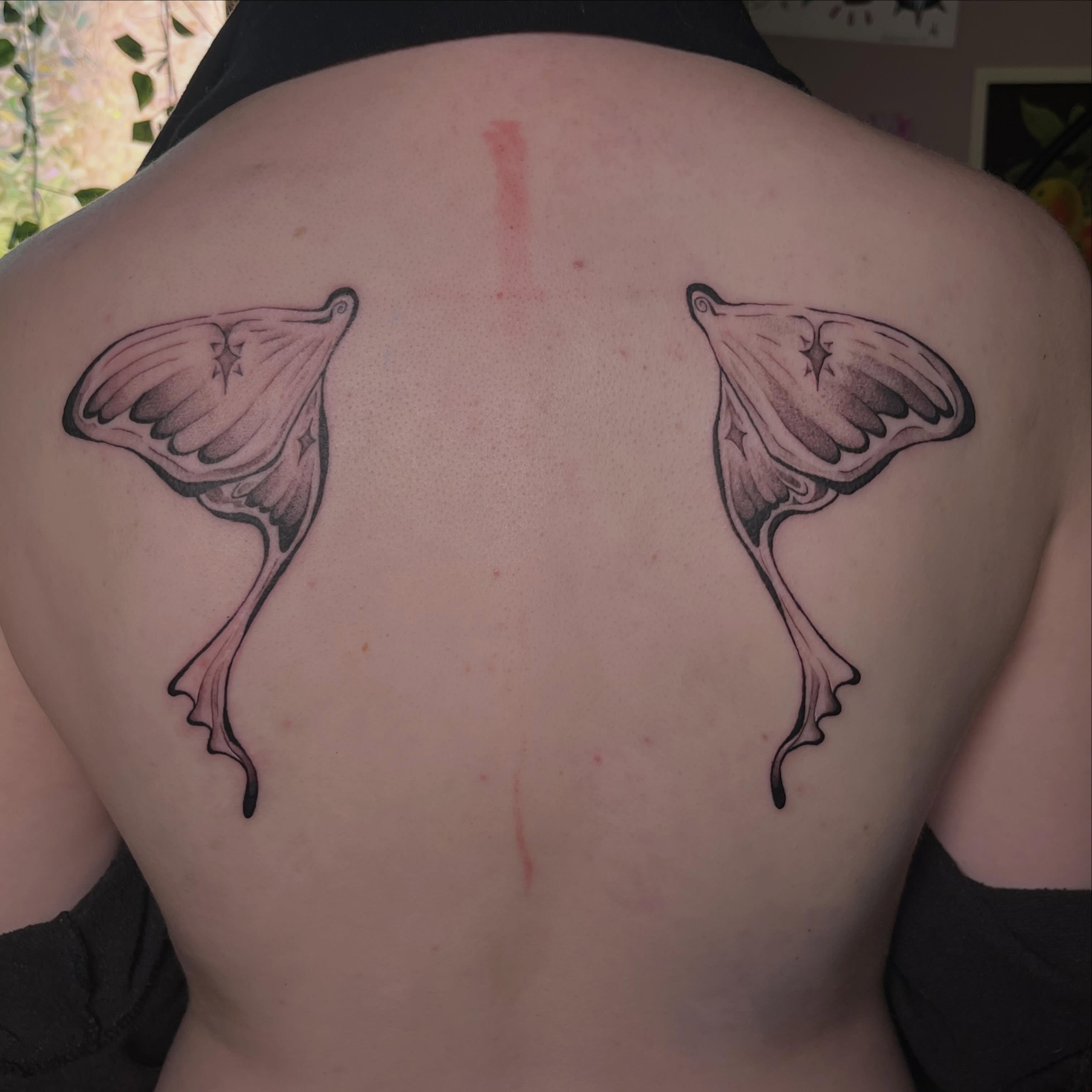 Flamingo black and grey tattoo on the back by Jazzy