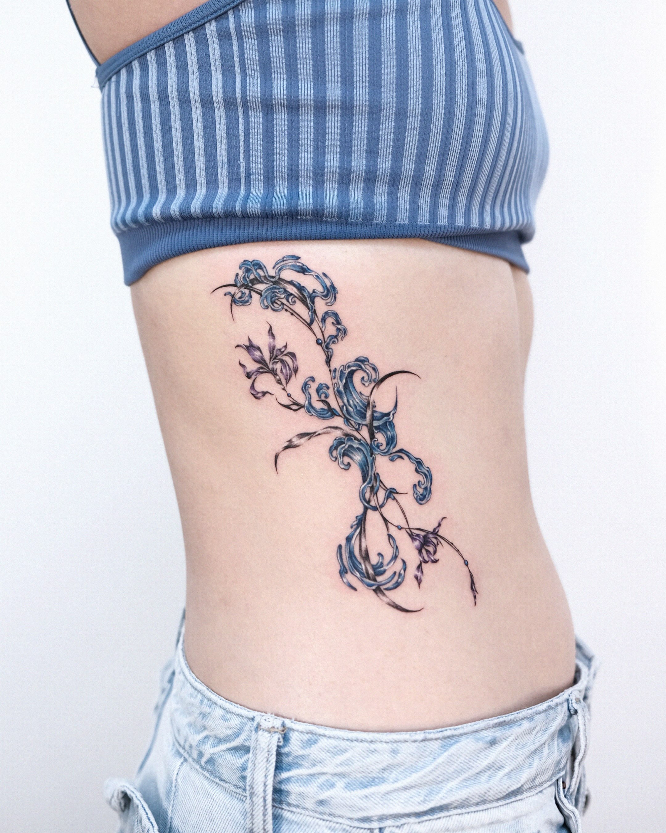 Floral design ornamental tattoo on the ribs by 애박 ⋆⁺₊ ₊⁺⋆ Aebak