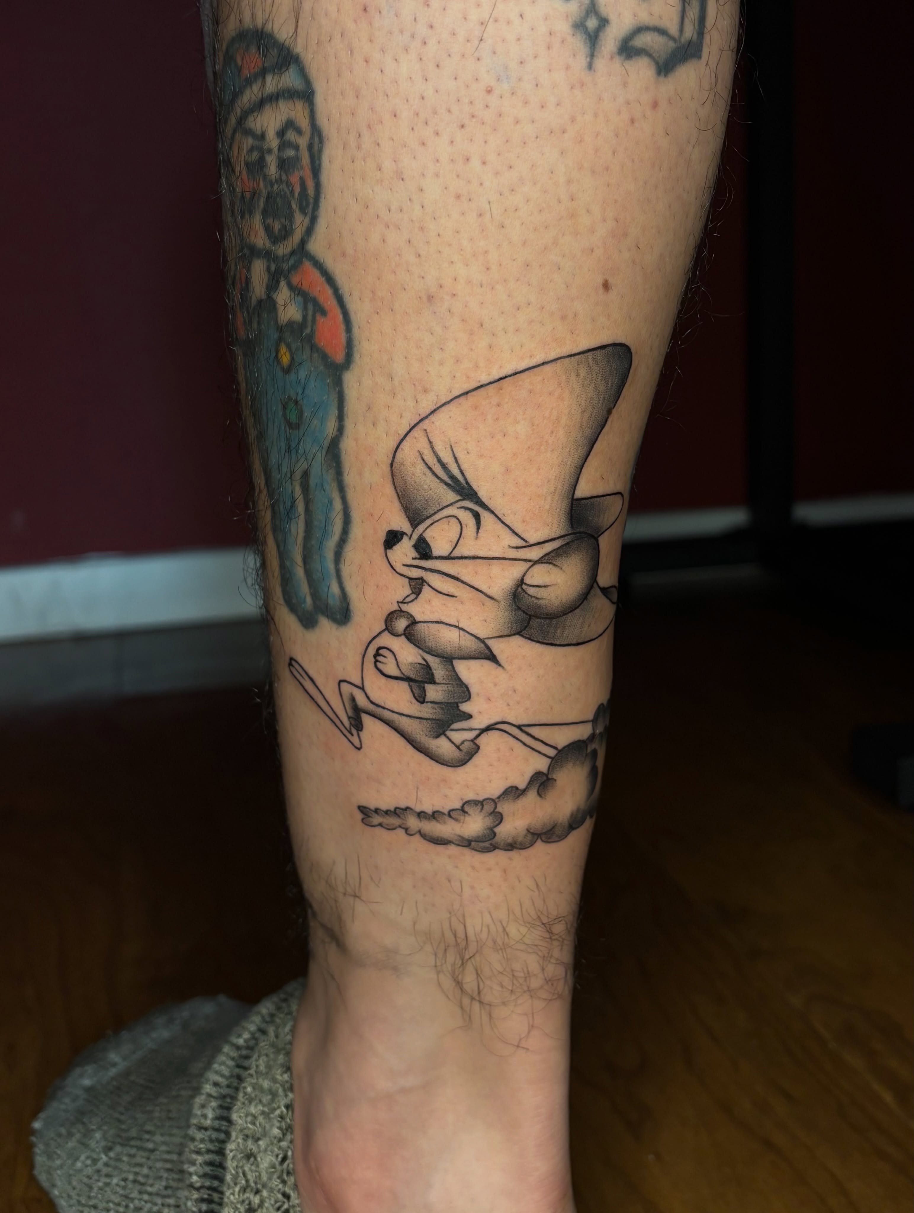 Tom and jerry black and grey tattoo on the forearm by the ink witch ๐ฎ๐ค๐