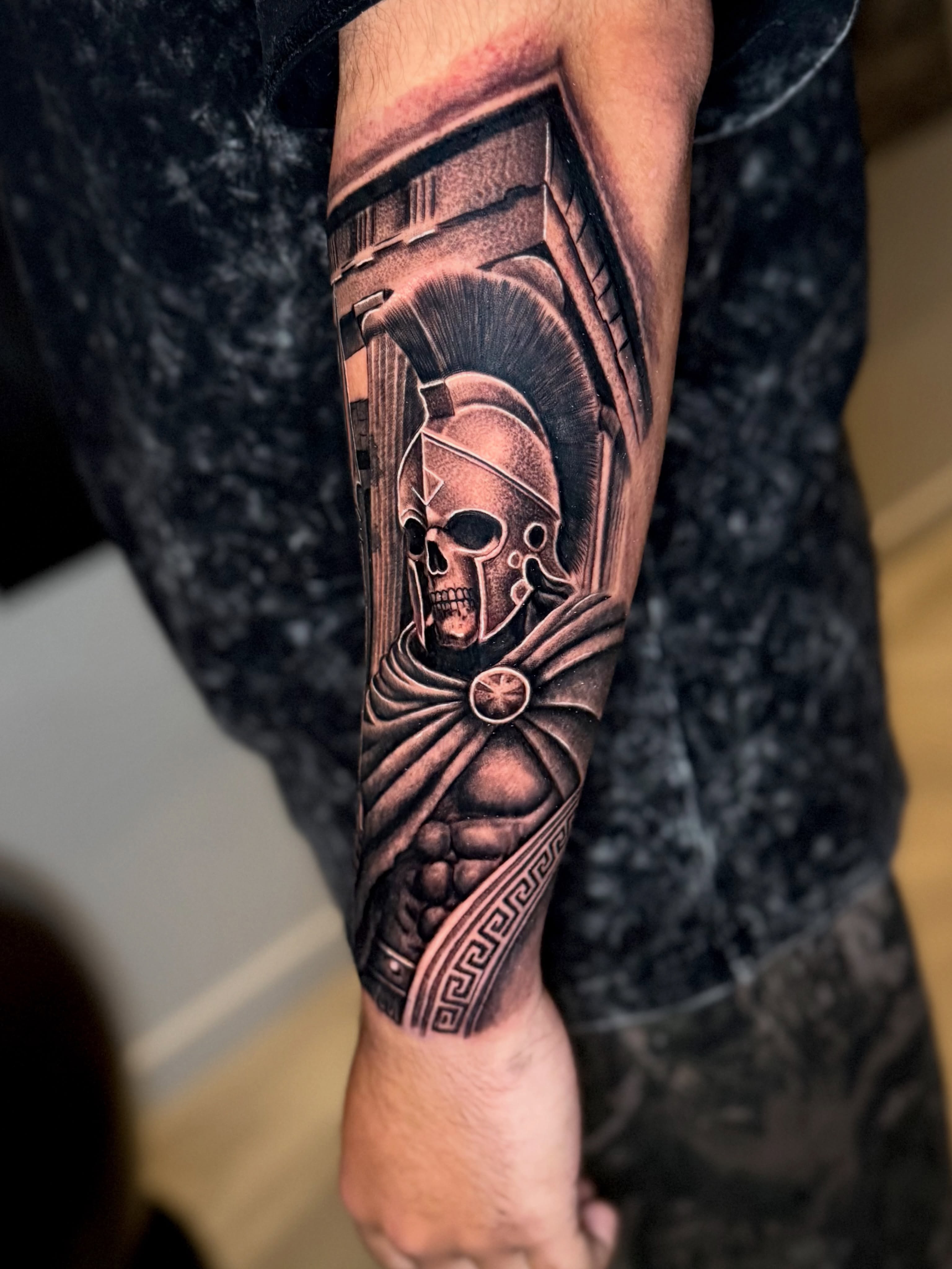 Roman warrior realism tattoo on the forearm by Brandon Patino