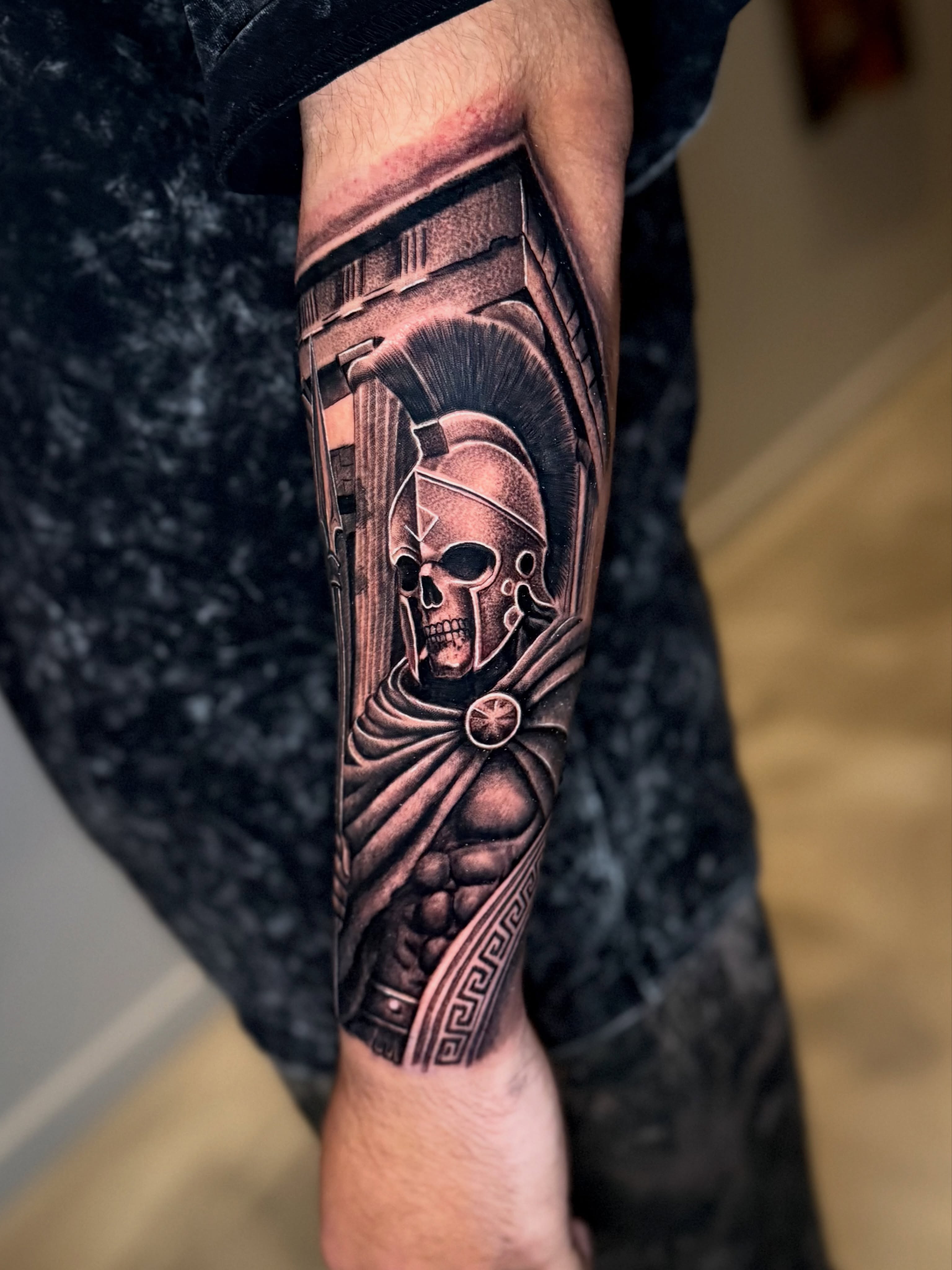 Ancient warrior realism tattoo on the forearm by Brandon Patino