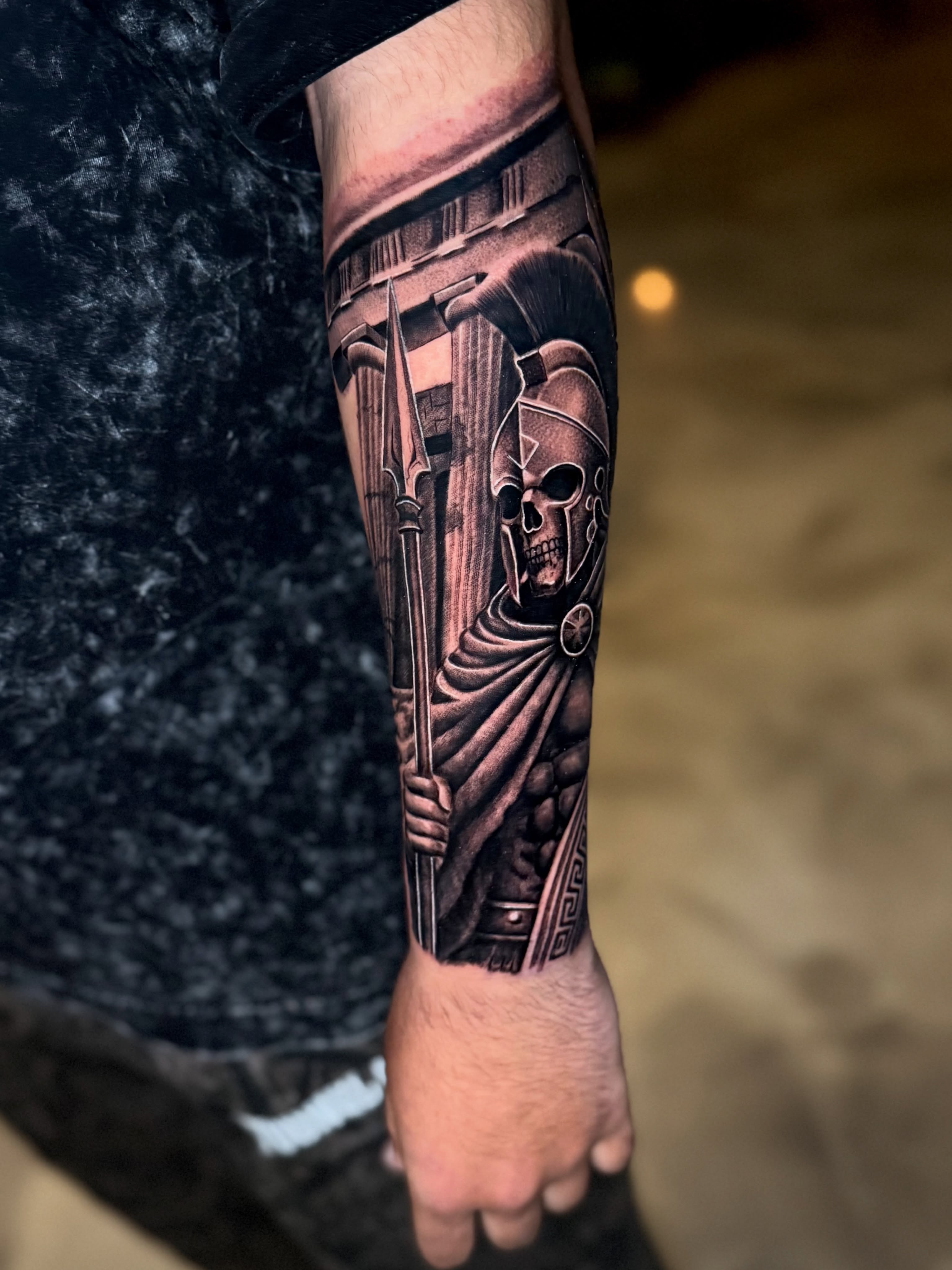 Grim reaper realism tattoo on the forearm by Brandon Patino