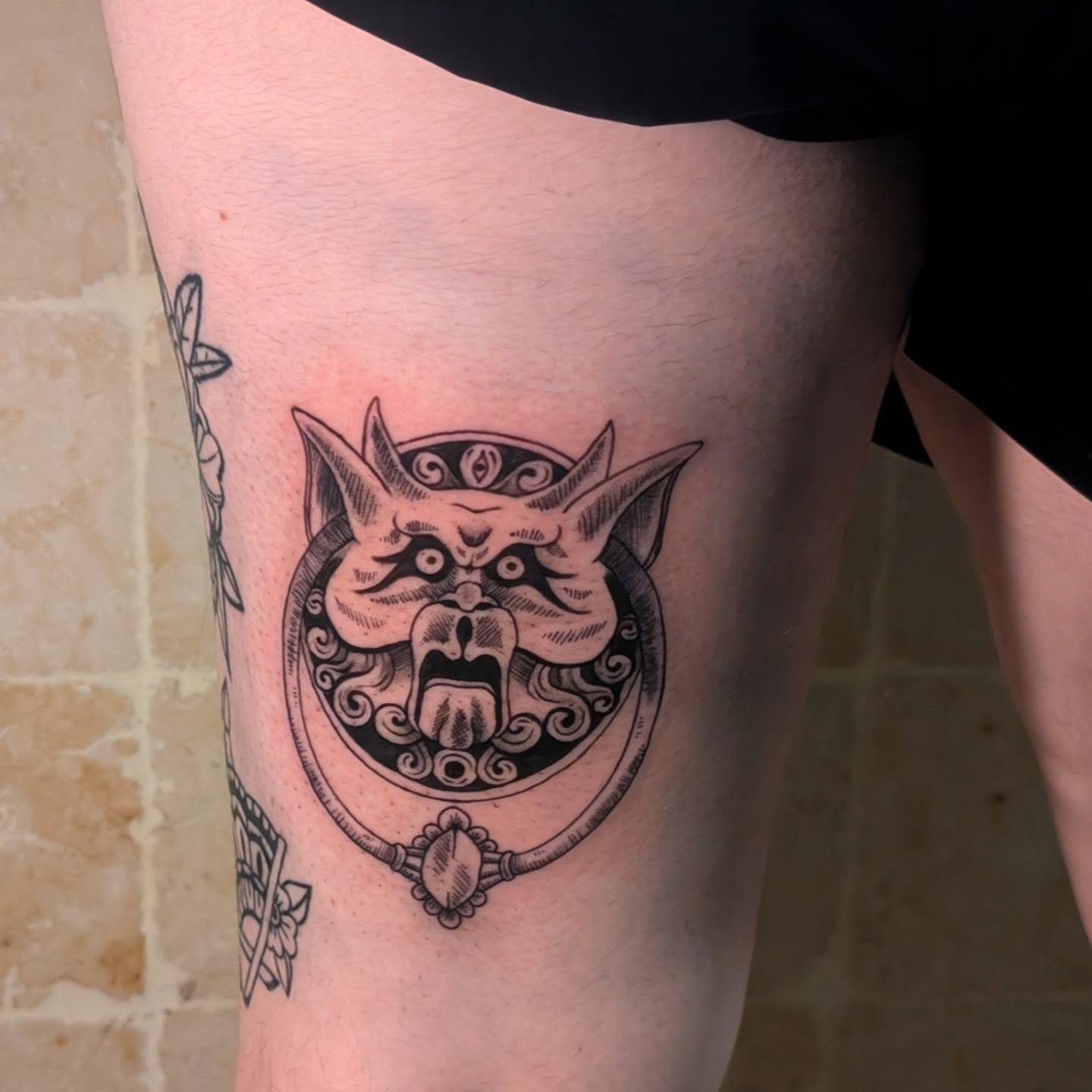 Cat mask black and grey tattoo on the thigh by Ari 💠🧜‍♂️🐟🎨🦑🐚💠