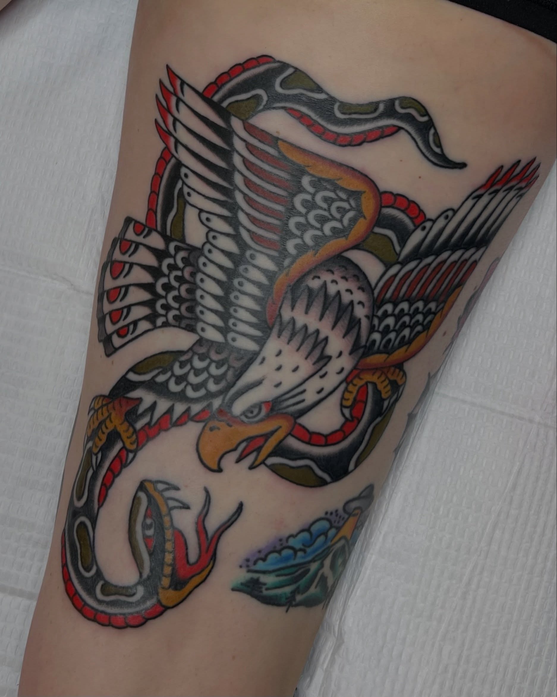 Eagle and snake American traditional tattoo on the forearm by Brian Visser