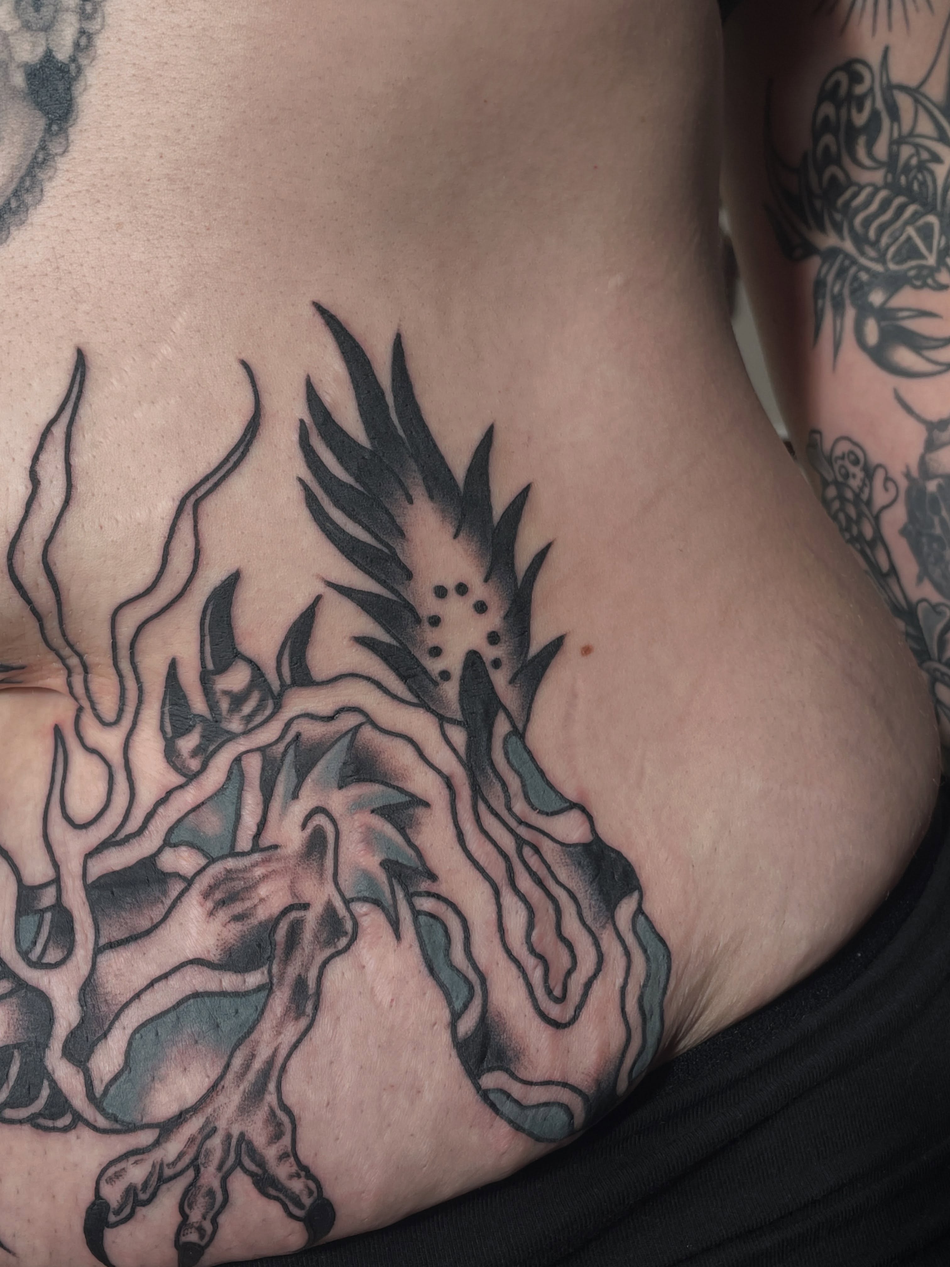 Tattoo by @trad_townsend — dotwork, black_and_grey