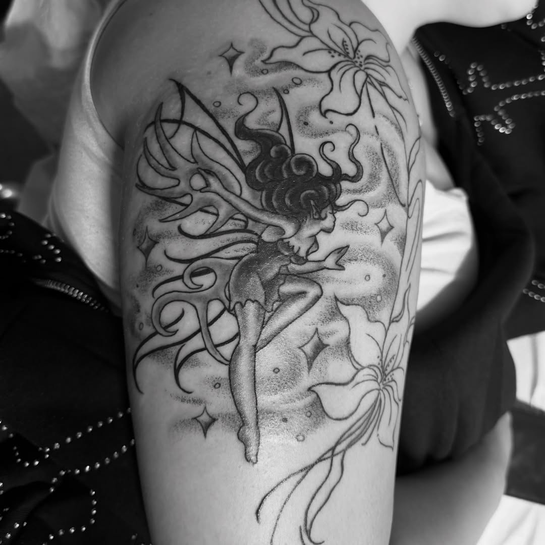 Fairy dotwork tattoo on the forearm by Spencer Coco