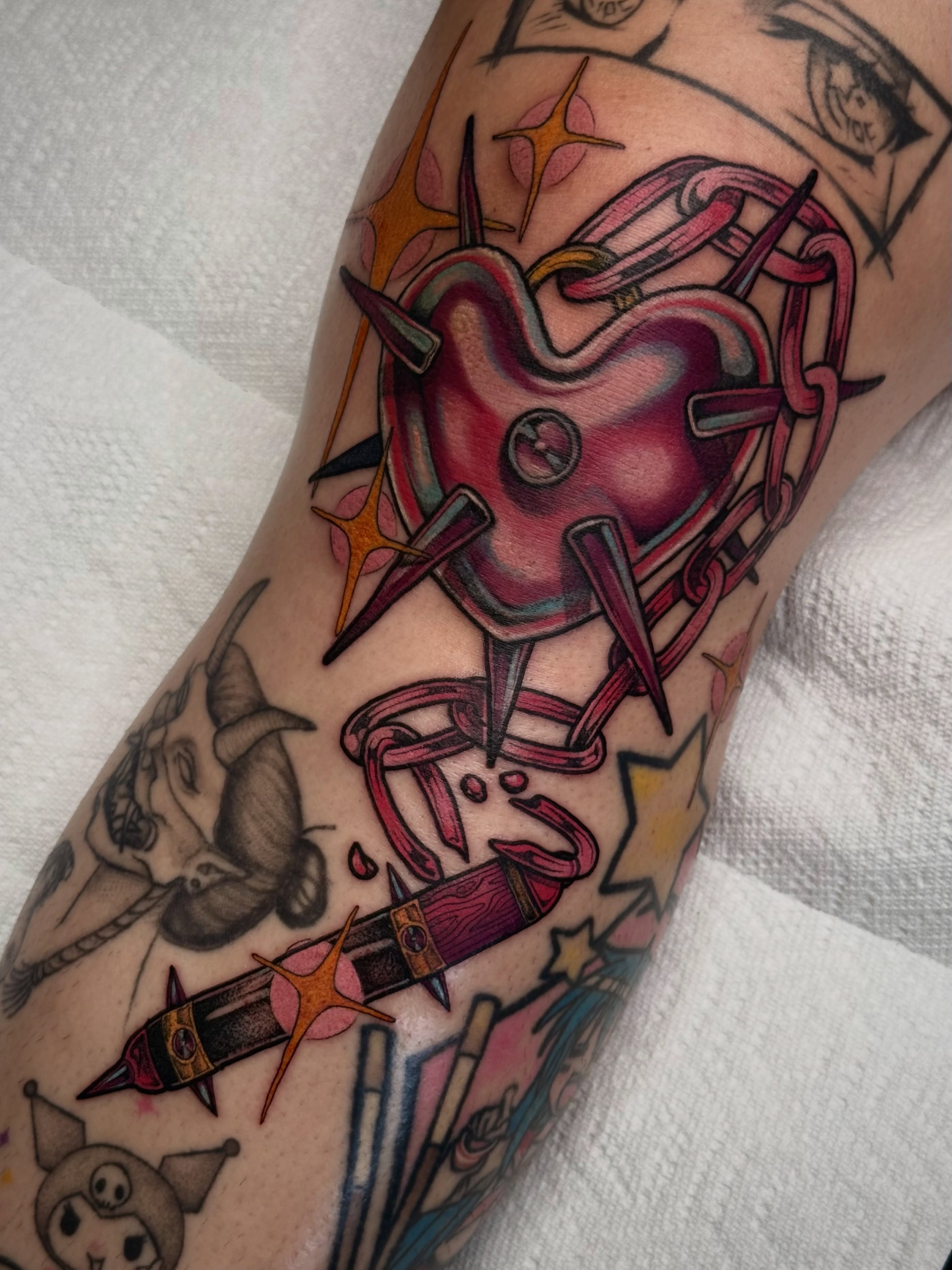 Heart with chains American traditional tattoo on the forearm by K9