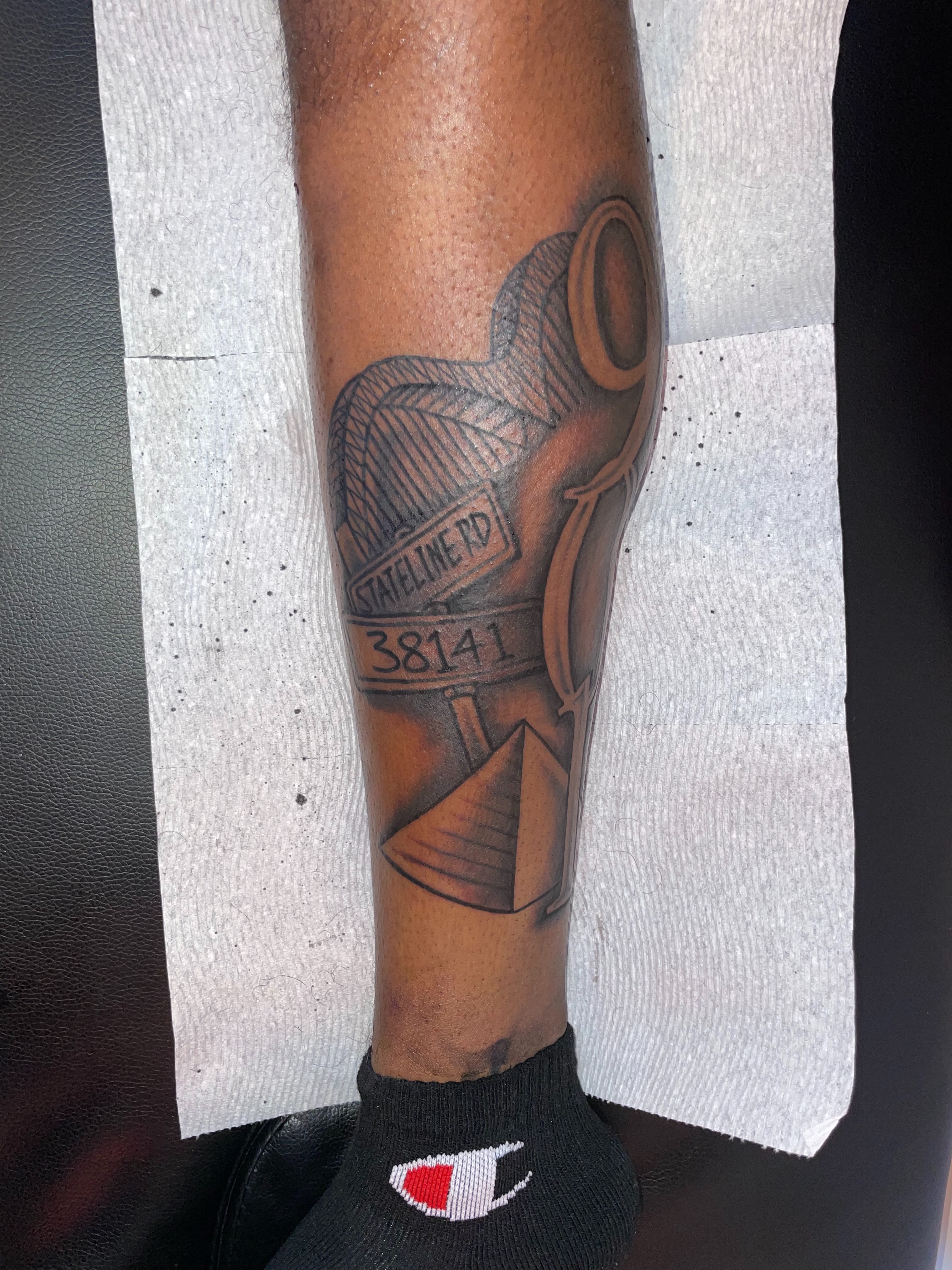 Fire hydrant black and grey tattoo on the forearm by TreCashTats💉🩸 MisfitzTattooStudio