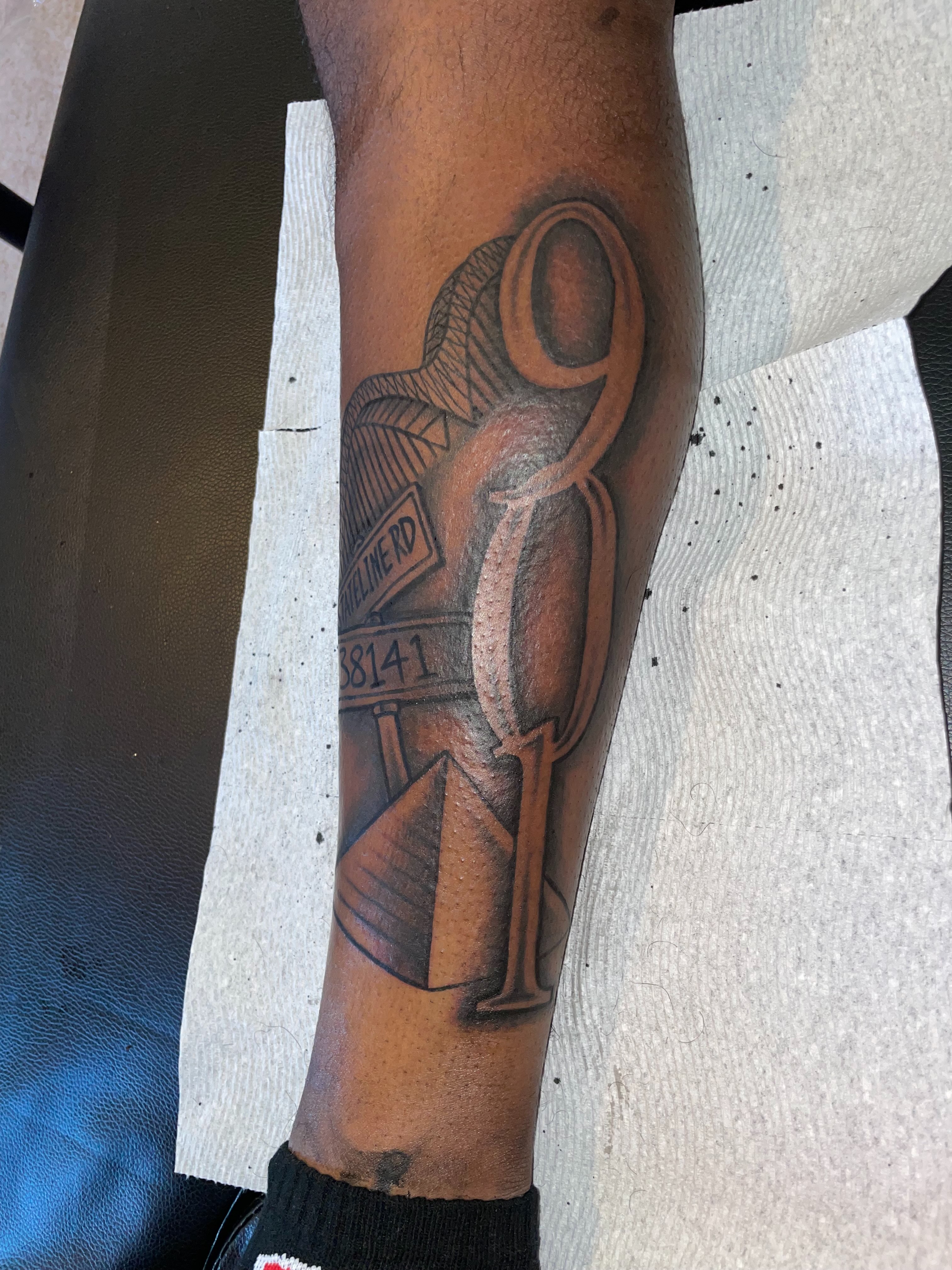 Ancient egyptian deity black and grey tattoo on the forearm by TreCashTats💉🩸 MisfitzTattooStudio