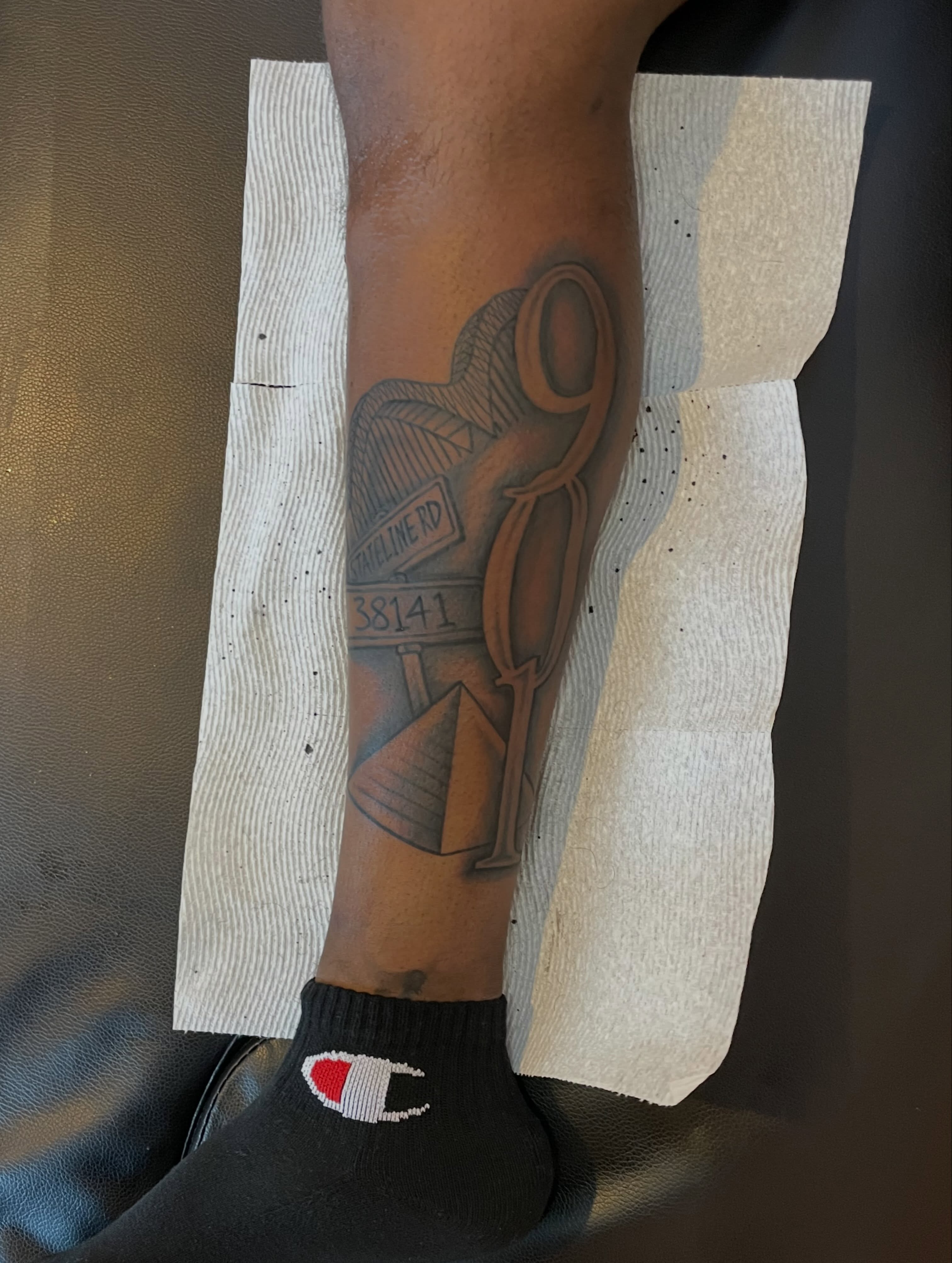 Camera black and grey tattoo on the forearm by TreCashTats💉🩸 MisfitzTattooStudio