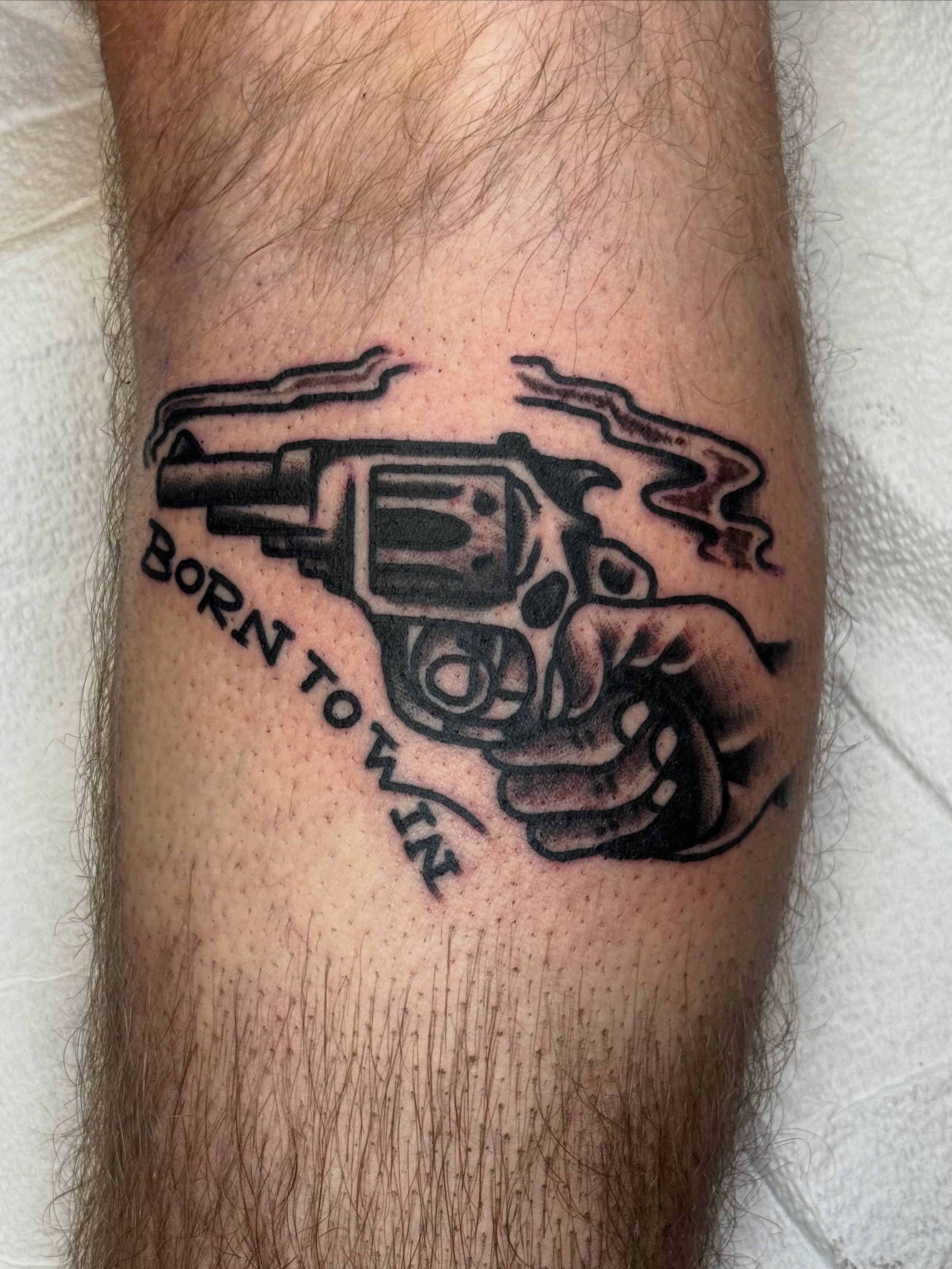 Revolver and text black and grey tattoo on the forearm by ๐ฎ๐๐๐๐ ๐ญ๐๐๐๐๐