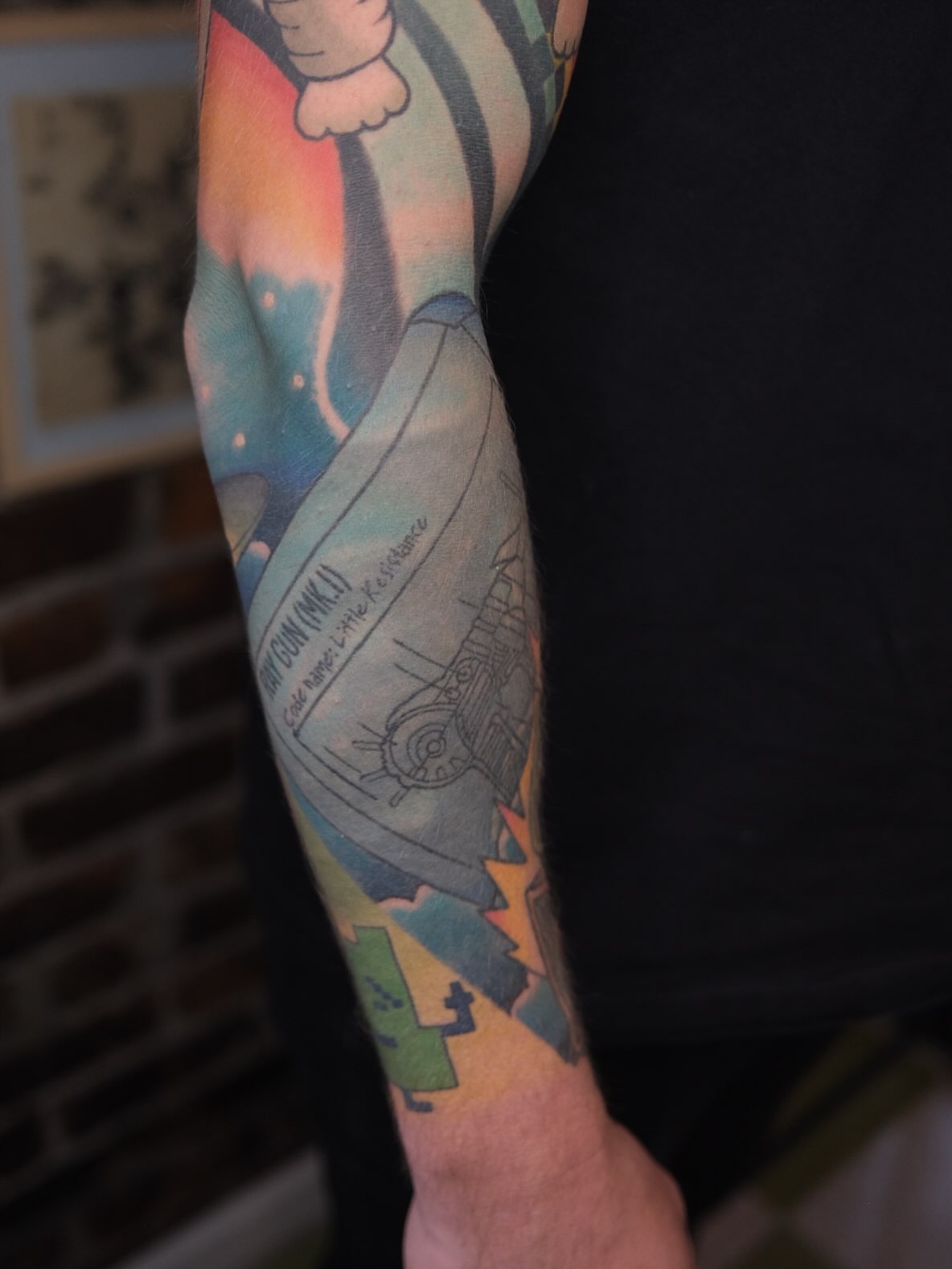 Car and character American traditional tattoo on the forearm by James Maxwell