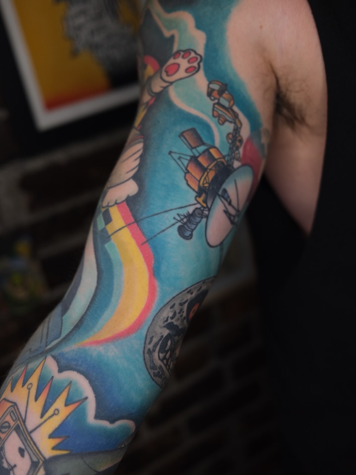 Space exploration new school tattoo on the forearm by James Maxwell