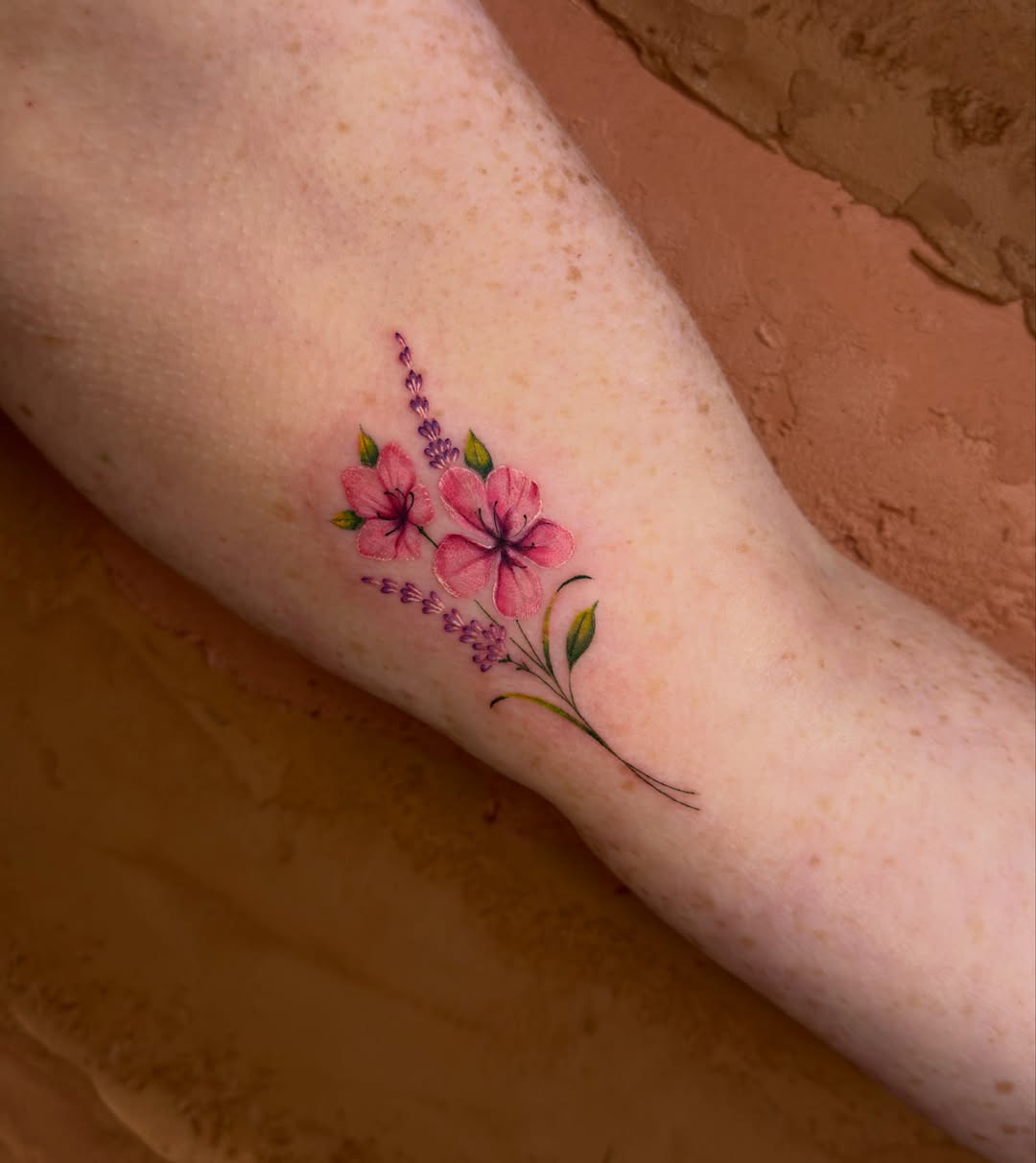 Tattoo by @heliast.tattoos — watercolor