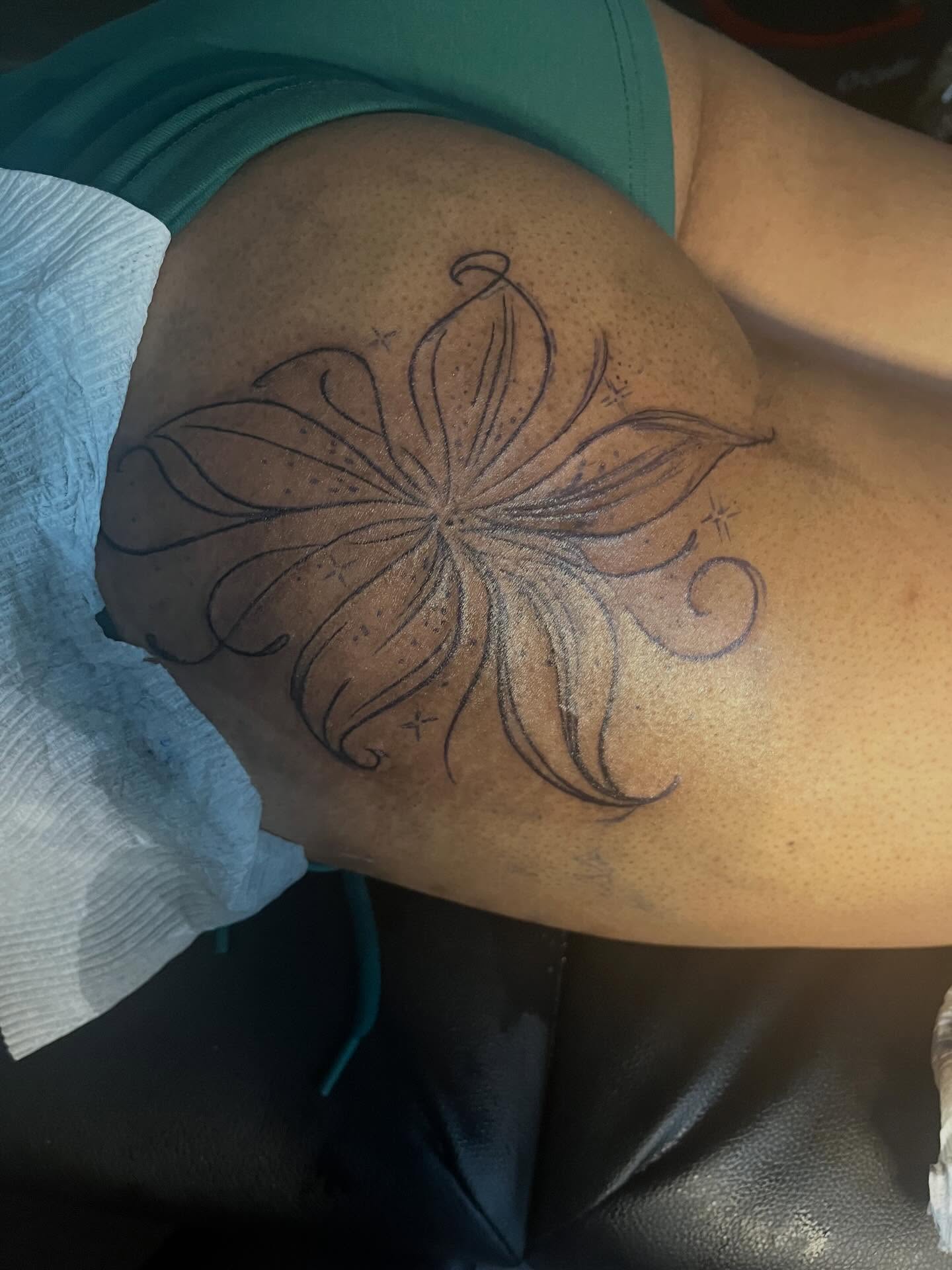 Flower dotwork tattoo on the thigh by π Westside