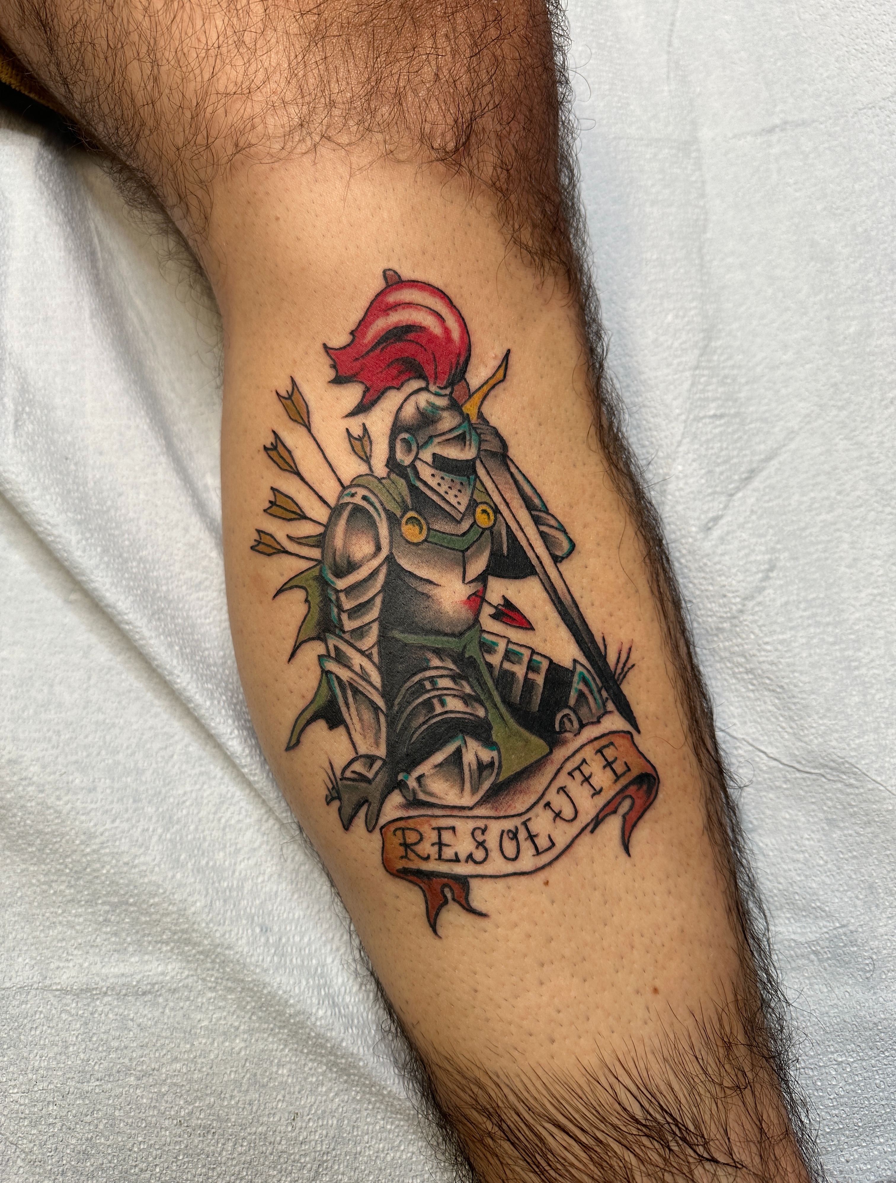 Knight with shield American traditional tattoo on the forearm by Craig Ryans