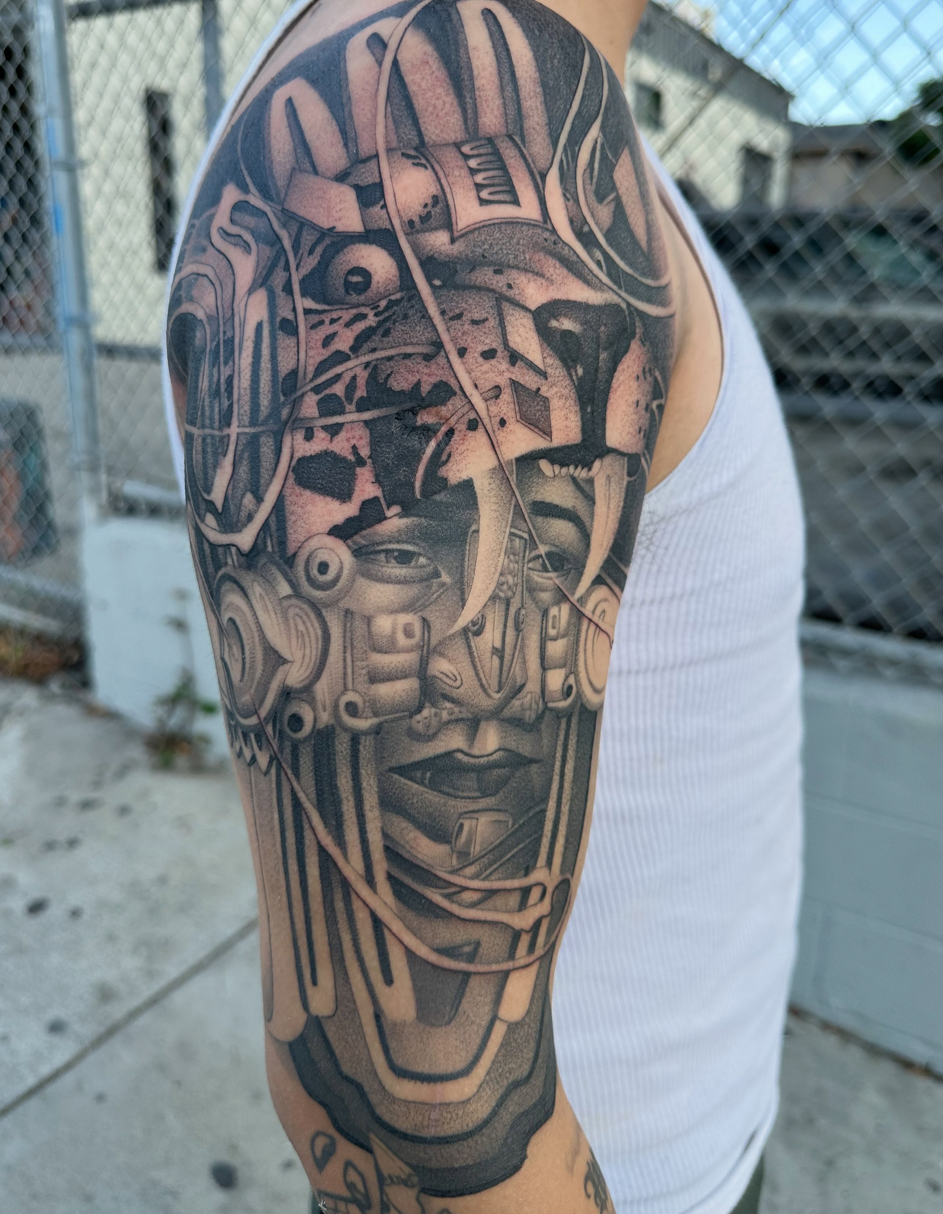 Cyborg face realism tattoo on the forearm by San Diego Tattoo Artist