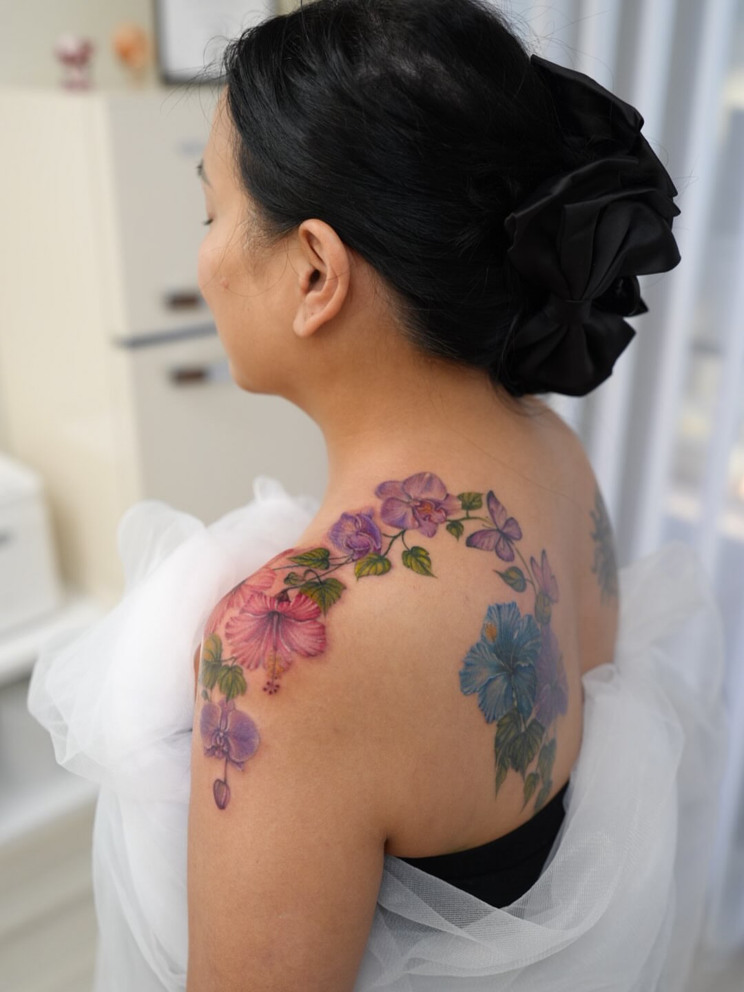 Floral arrangement realism tattoo on the shoulder by New Root Ink _Studio
