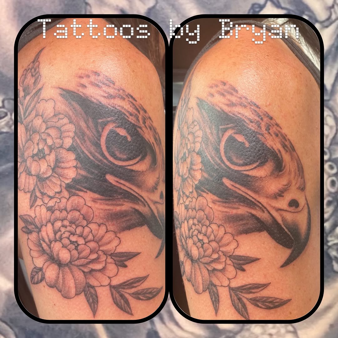 Owl and flowers realism tattoo on the shoulder by Bryan Hunt