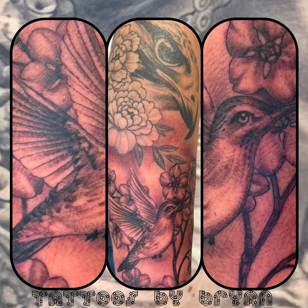 Hummingbird and flowers realism tattoo on the forearm by Bryan Hunt
