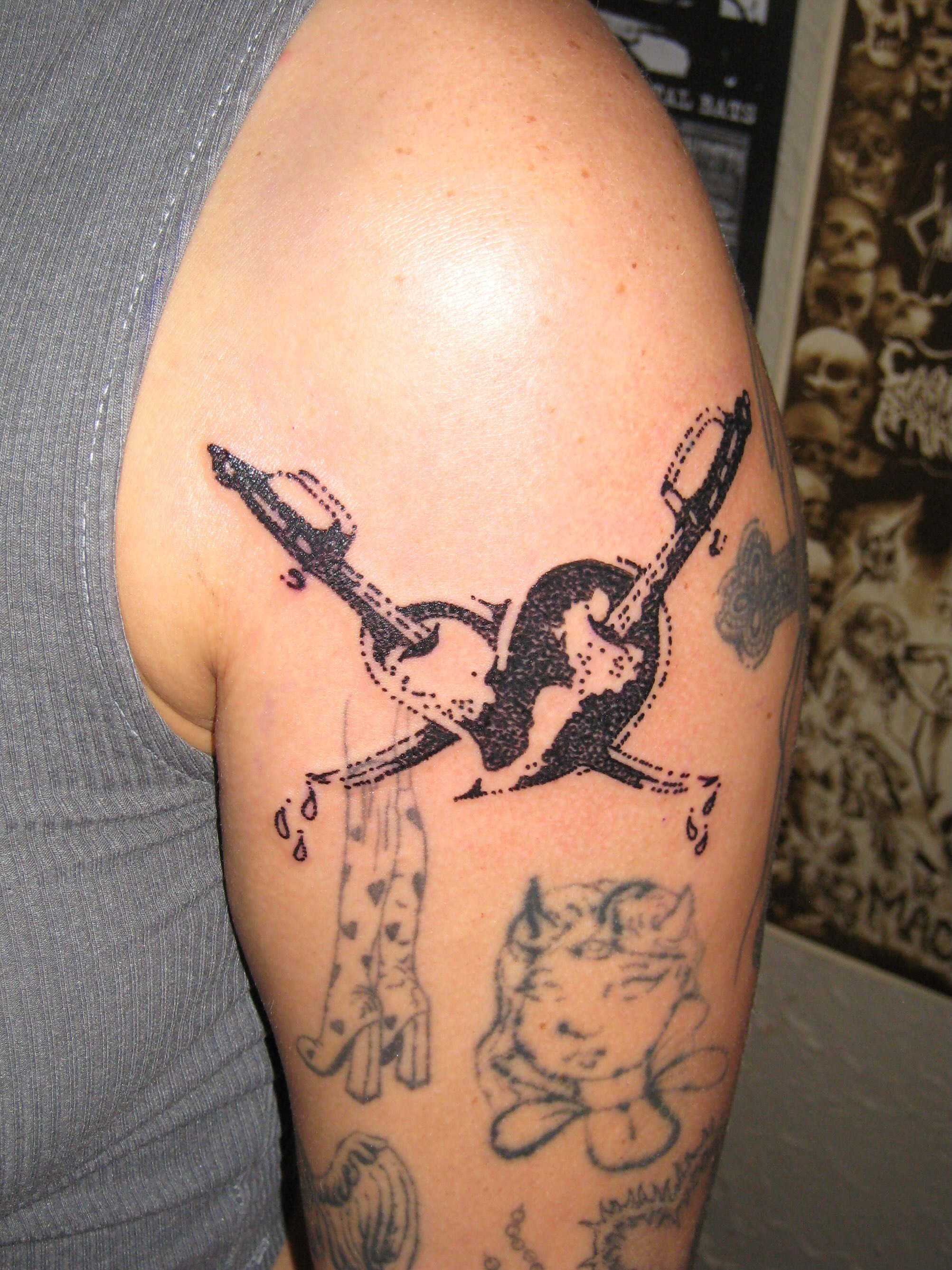 Key and lock dotwork tattoo on the shoulder by jonatan