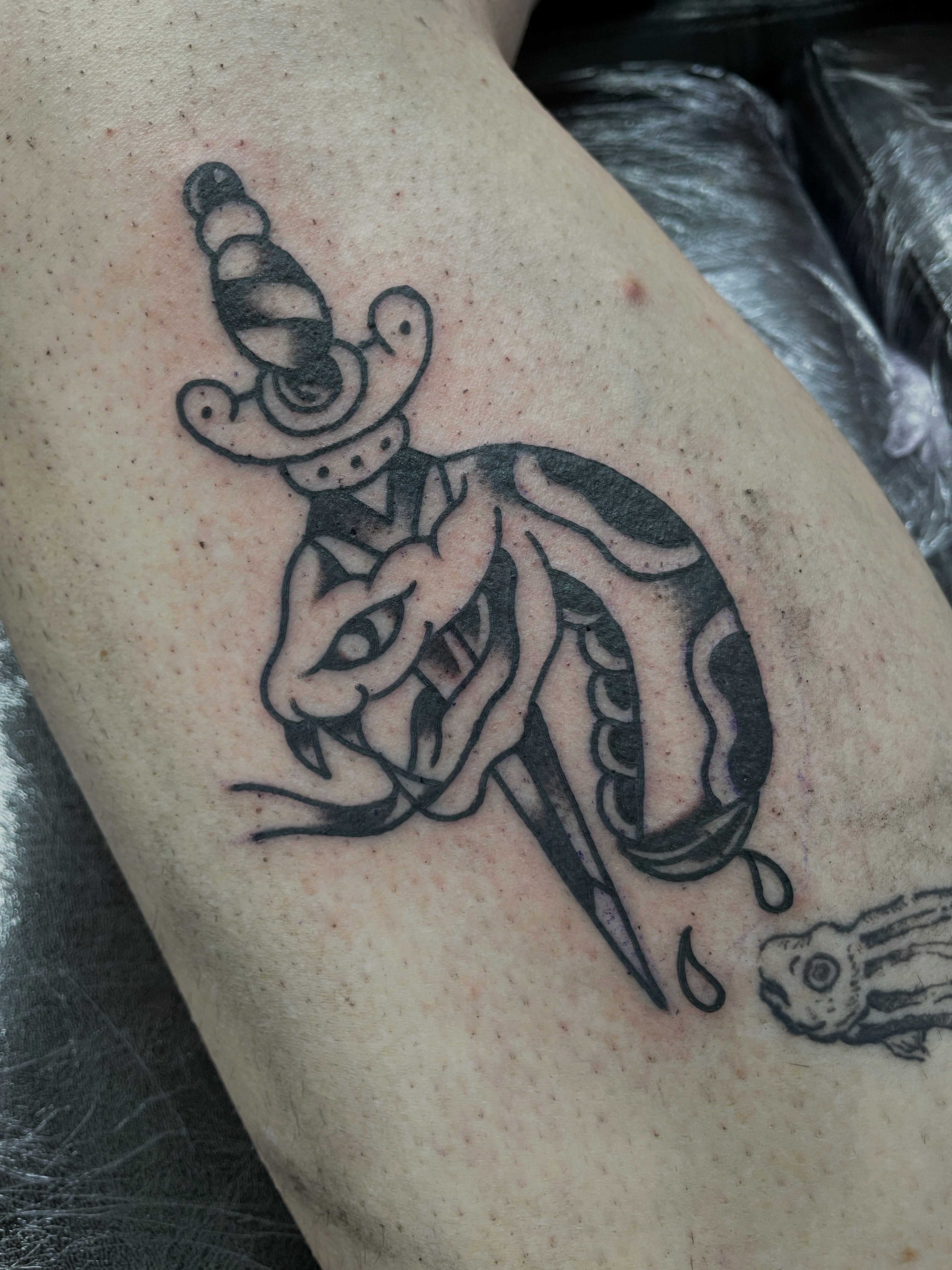 Tattoo by @trad_townsend — black_and_grey