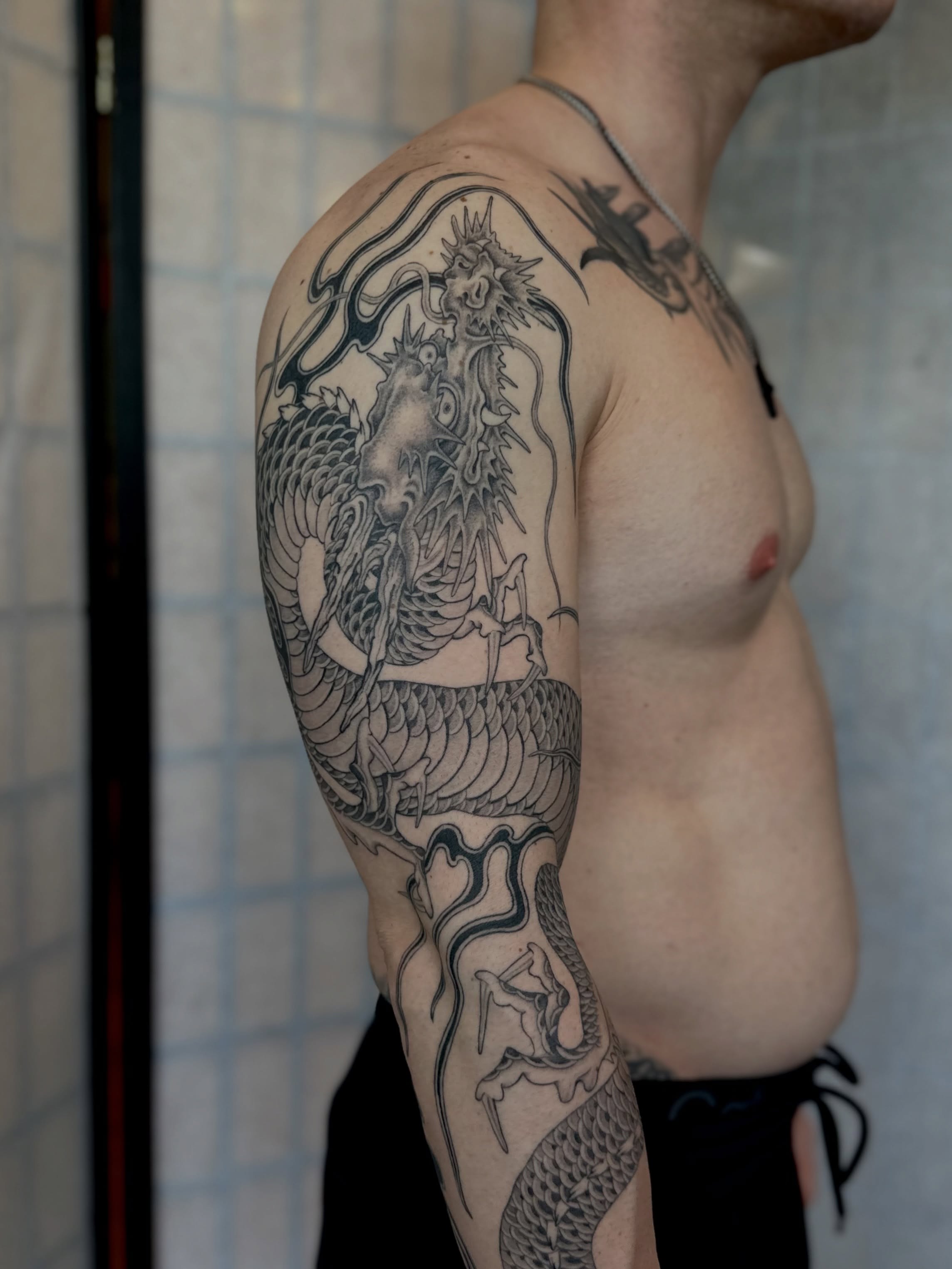 Dragon and horse japanese irezumi tattoo on the upper arm by Адріянна Стабс 🇺🇦, New York, New York