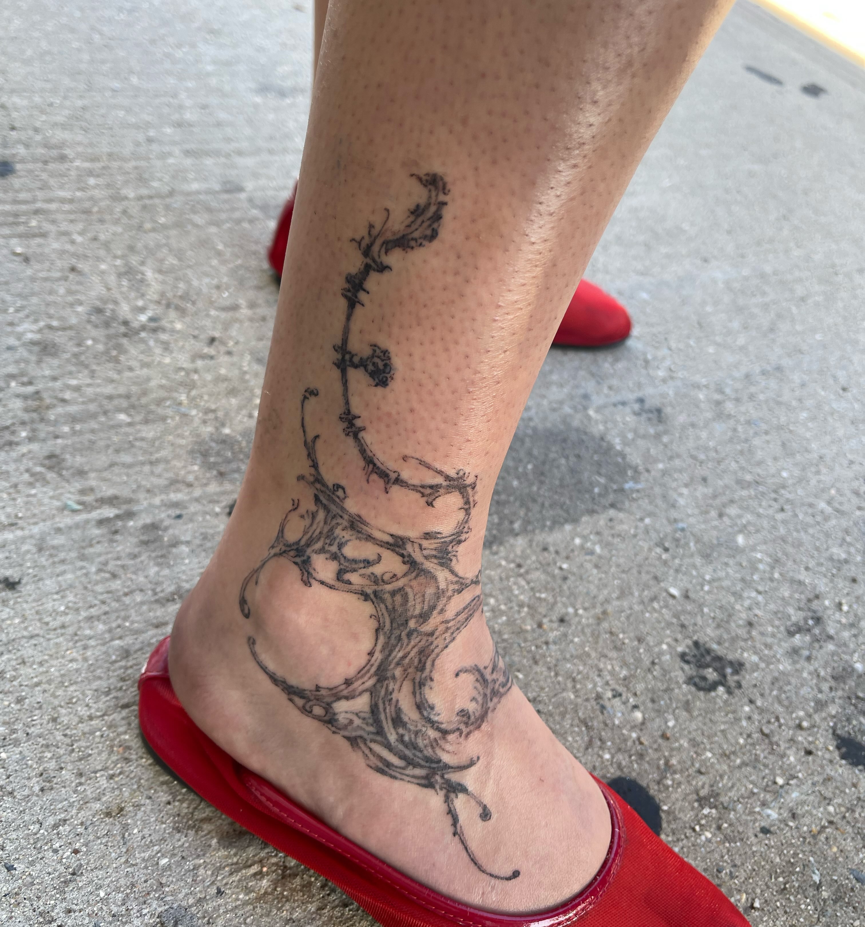 Antlers black and grey tattoo on the foot by @initiationoftorture