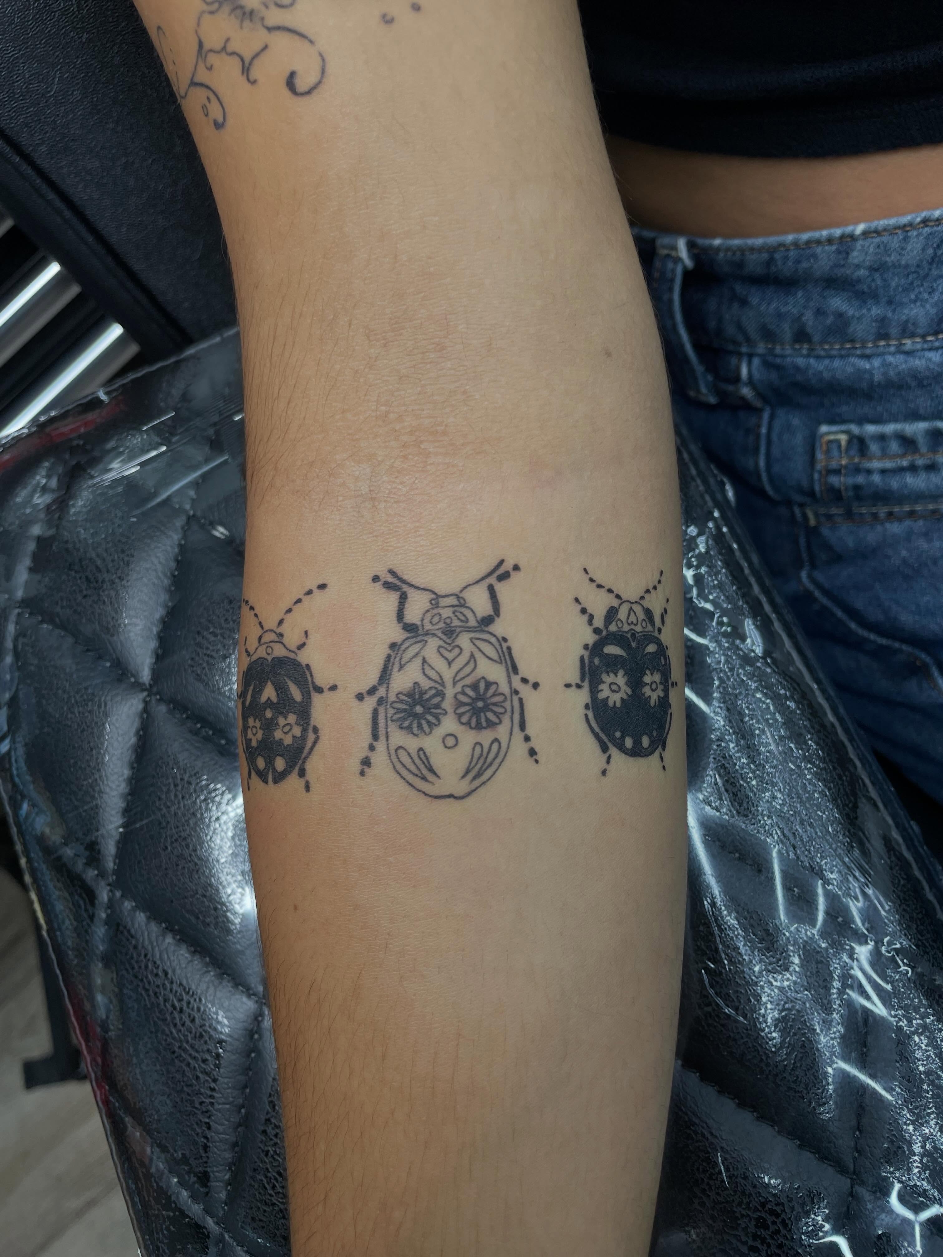 Beetles black and grey tattoo on the forearm by ꧁༺𝔅𝔦𝔤 ℭ𝔥𝔲𝔫𝔤𝔲𝔷༻꧂, San Diego, California