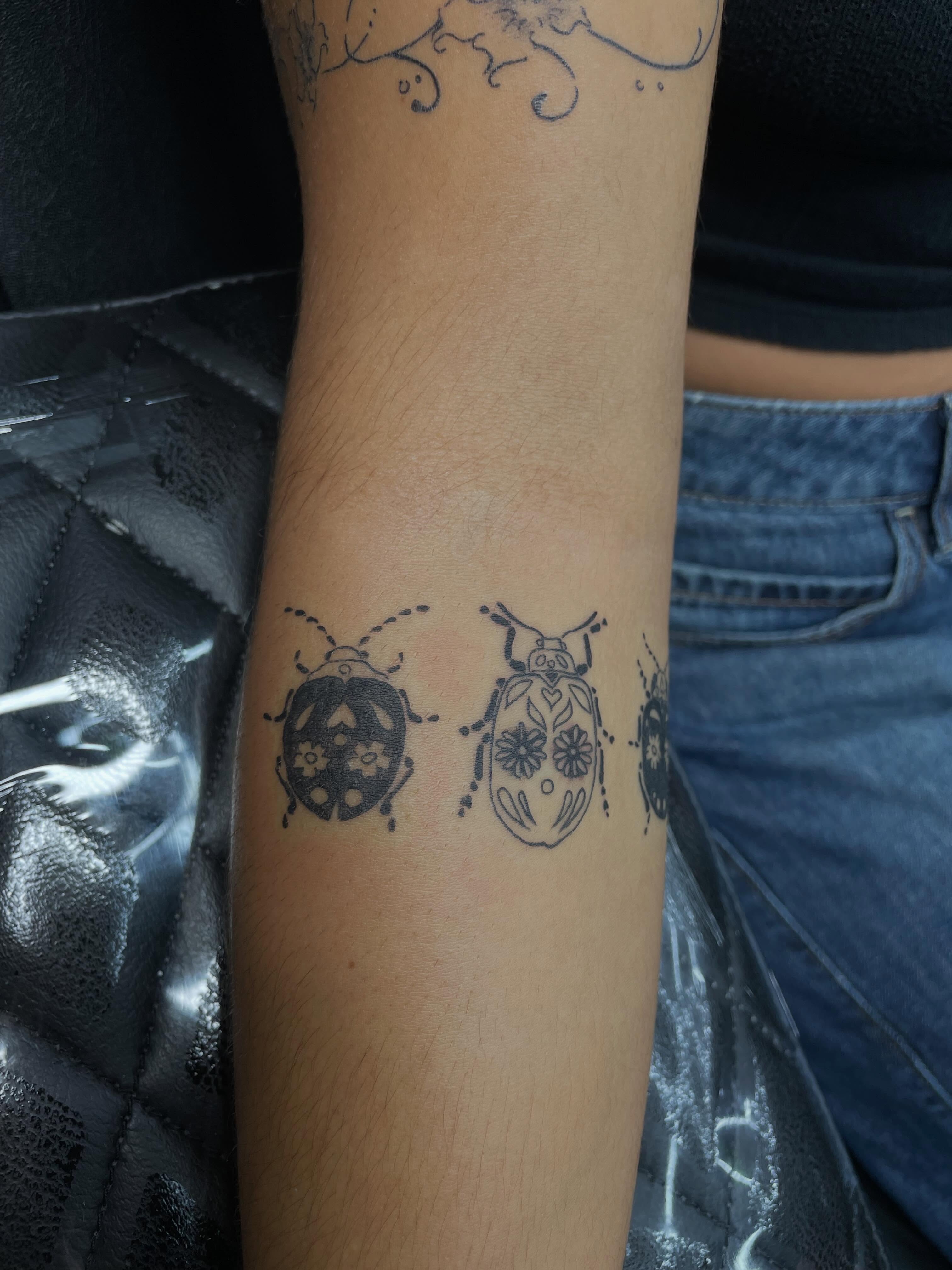 Beetles black and grey tattoo on the forearm by ꧁༺𝔅𝔦𝔤 ℭ𝔥𝔲𝔫𝔤𝔲𝔷༻꧂, San Diego, California