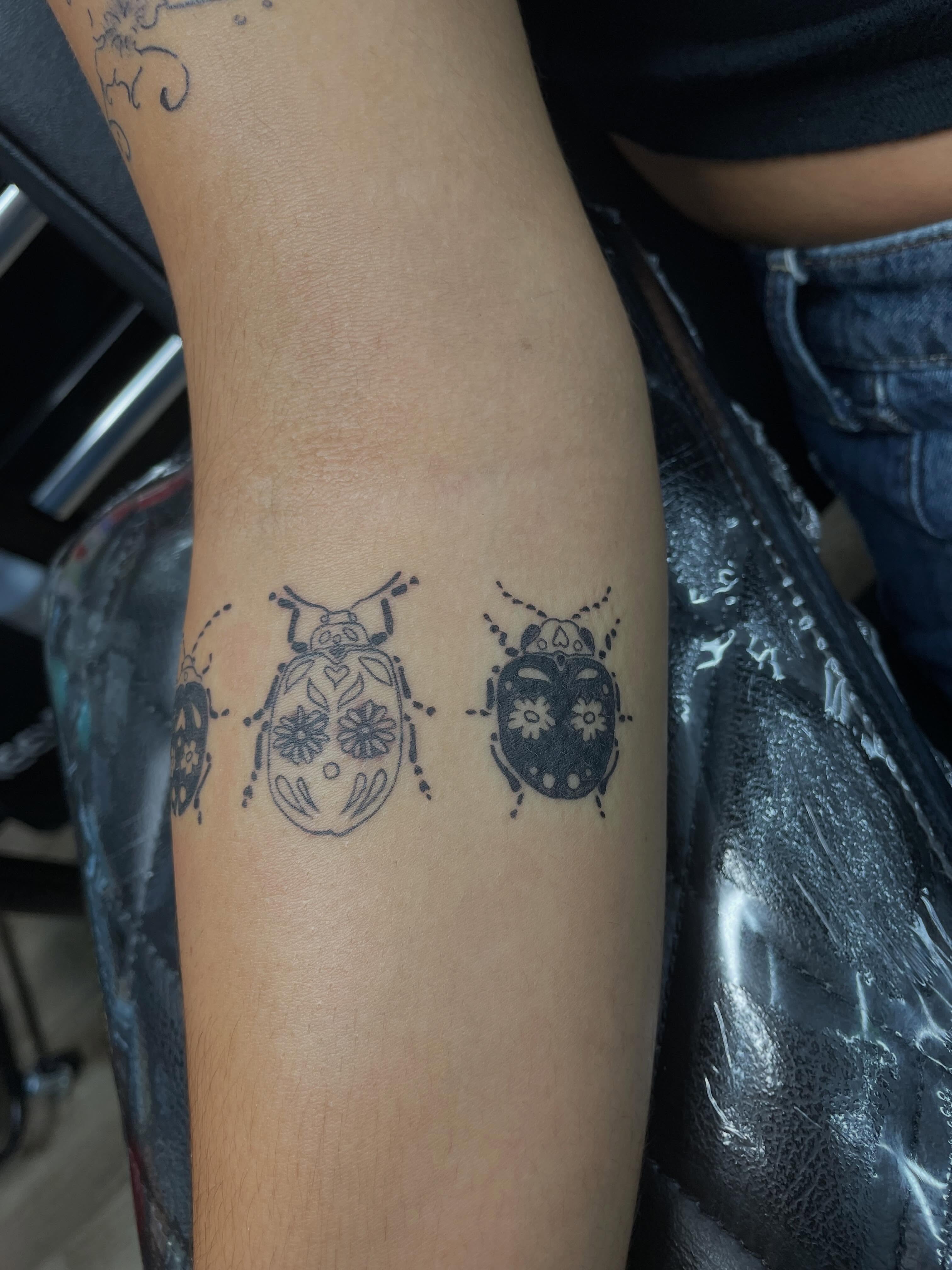 Beetles black and grey tattoo on the forearm by ꧁༺𝔅𝔦𝔤 ℭ𝔥𝔲𝔫𝔤𝔲𝔷༻꧂, San Diego, California