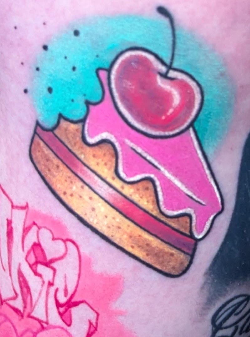 Slice of cake with cherry American traditional tattoo on the forearm by Raven FM-Tattoo Apprentice
